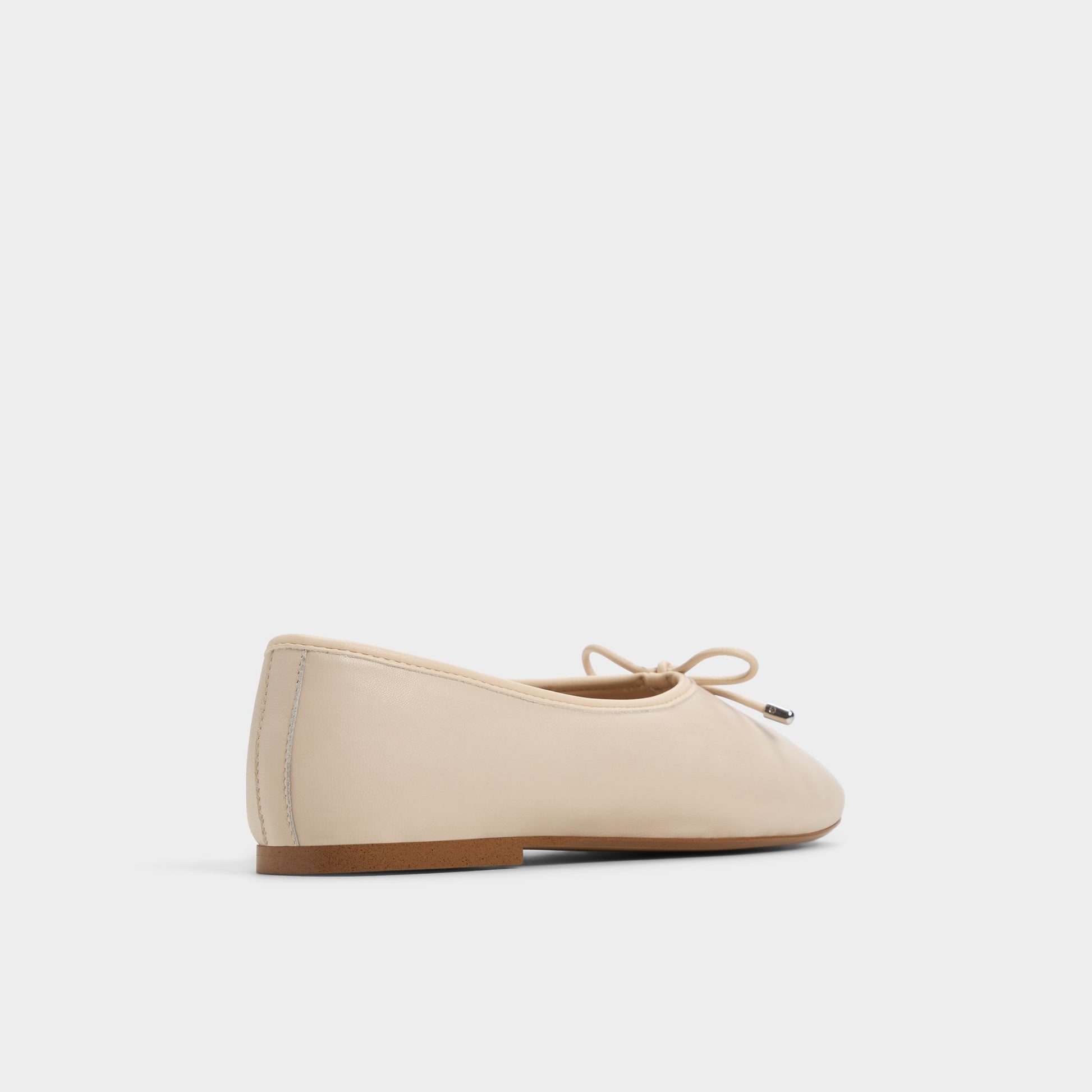 Three-quarter angle of Other Beige Joselie Ballerina's back side