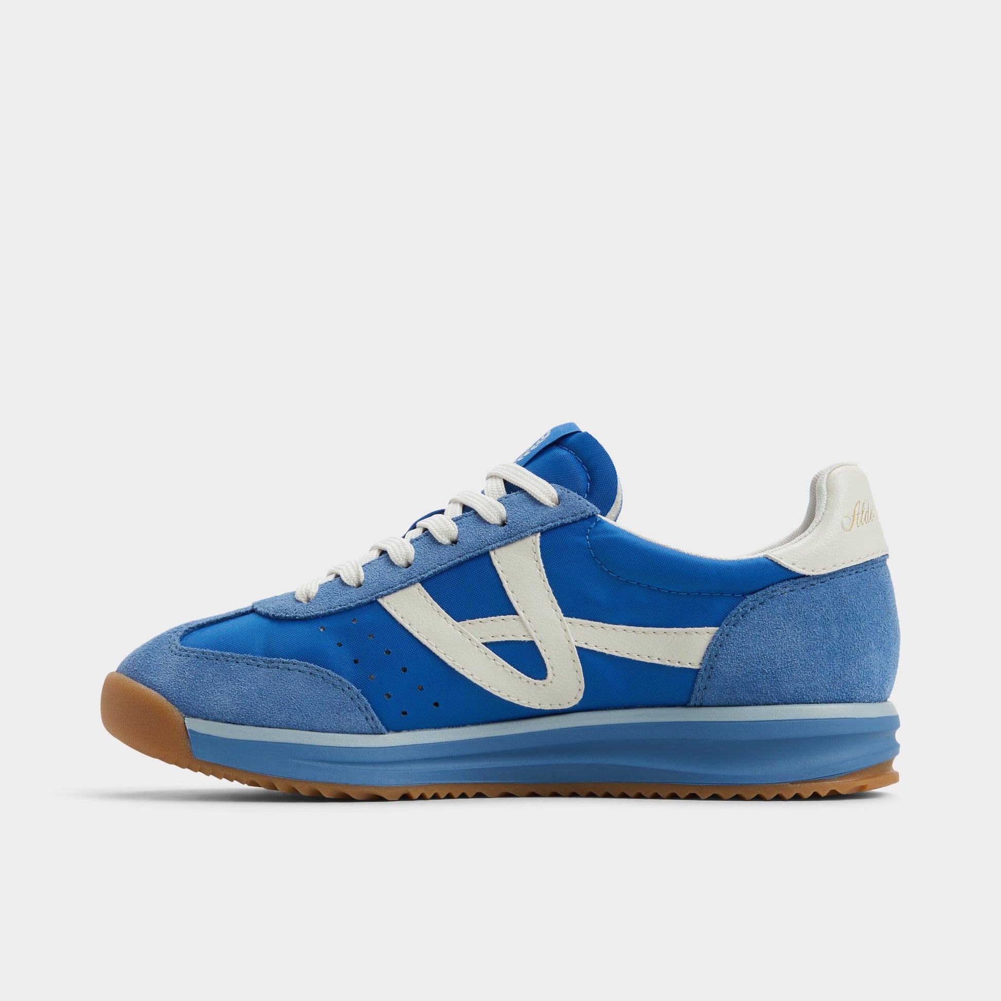 Side view of Blue Combo Stepcount Jogger sneaker