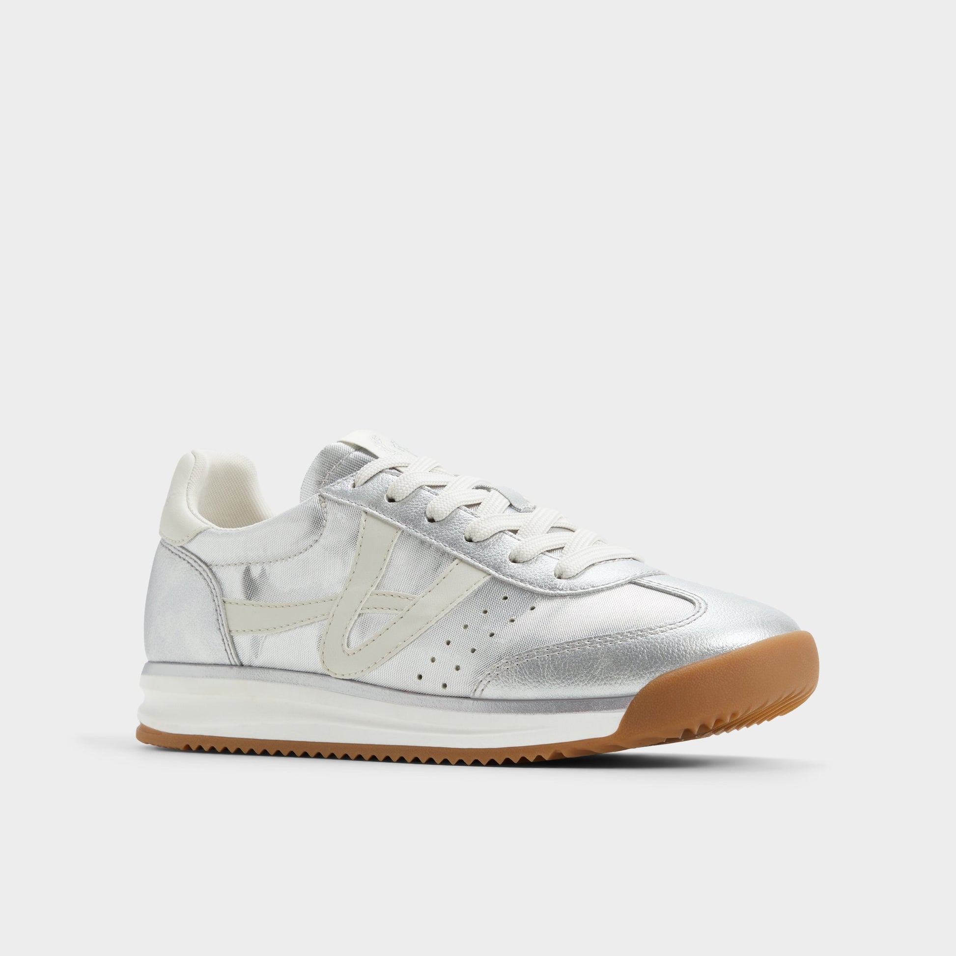 Three-quarter angle of Silver Stepcount Jogger sneaker's front side