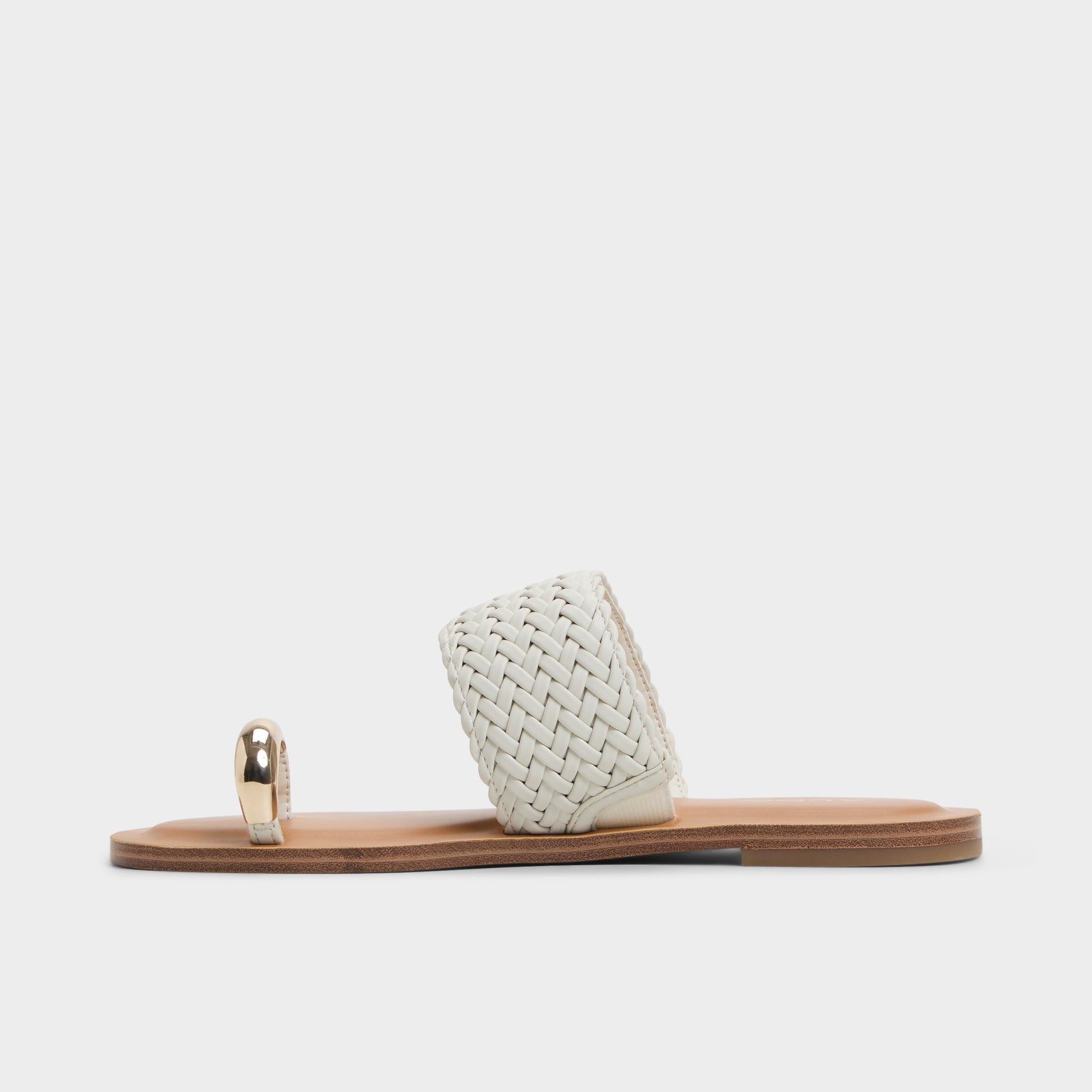 Side view of White/Bone Beachwalk Slide sandal
