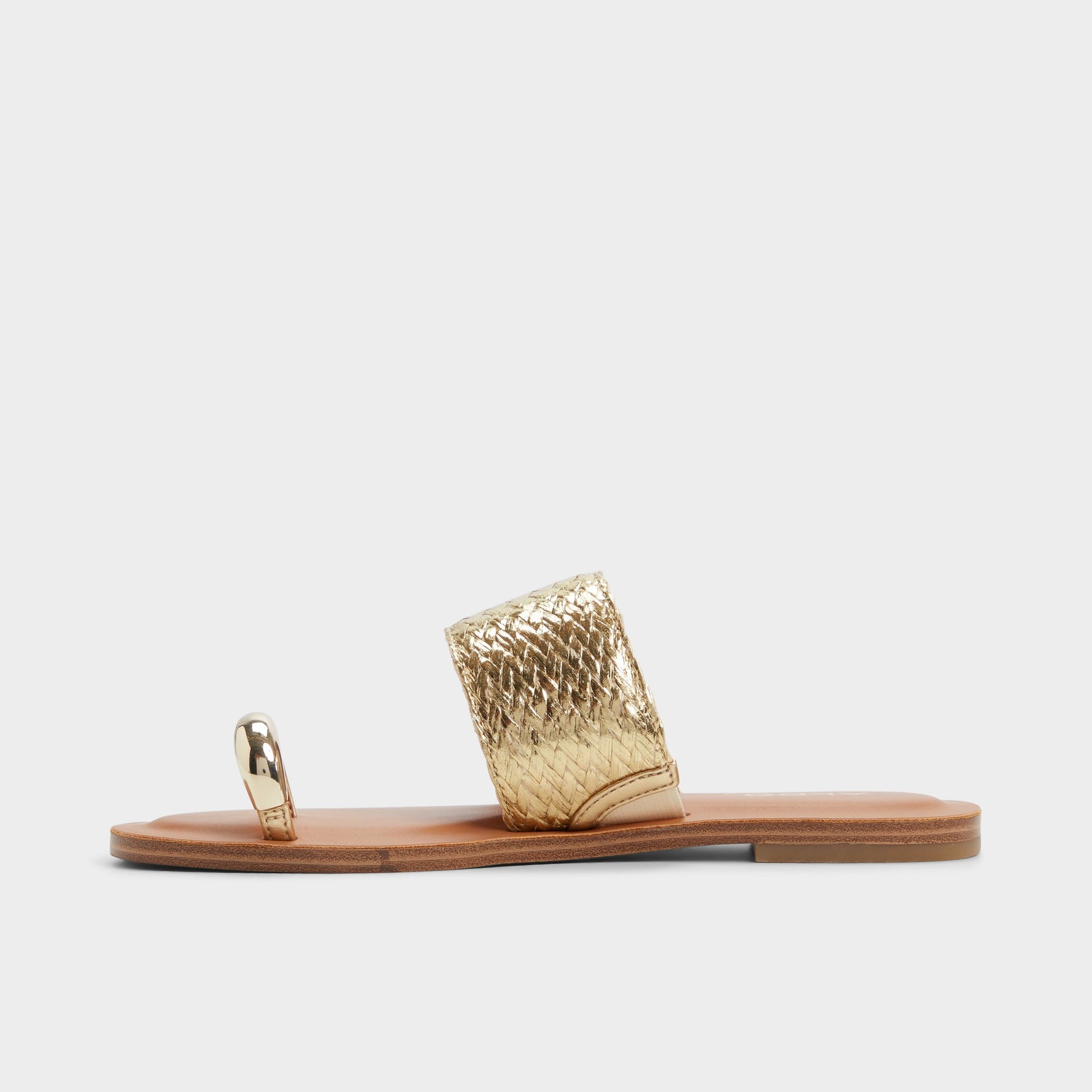 Side view of Gold Beachwalk Slide sandal