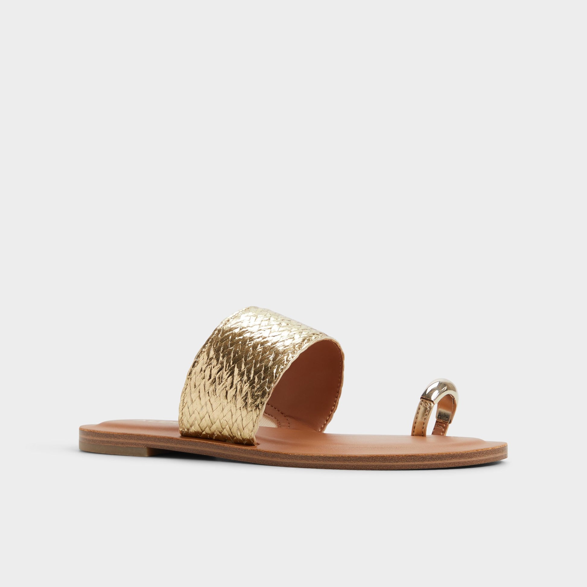 Three-quarter angle of Gold Beachwalk Slide sandal's front side