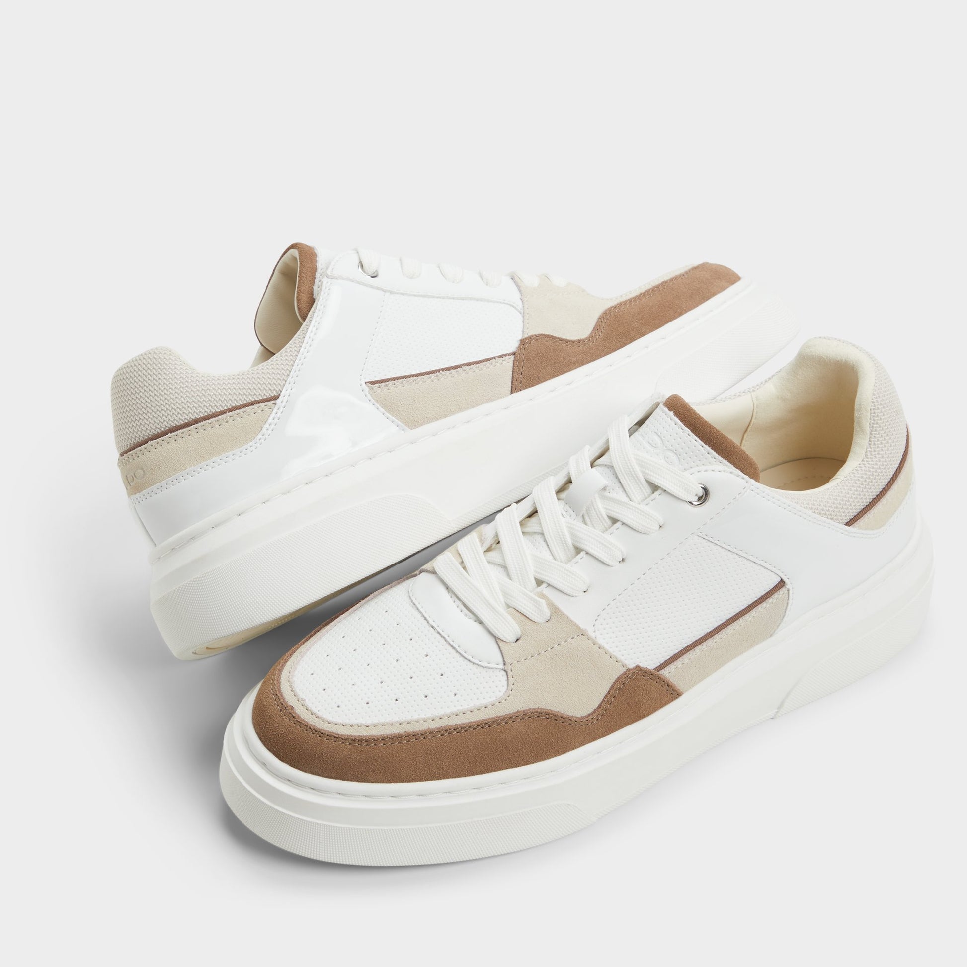 Highlighted view of a pair of White Combo Callisto s