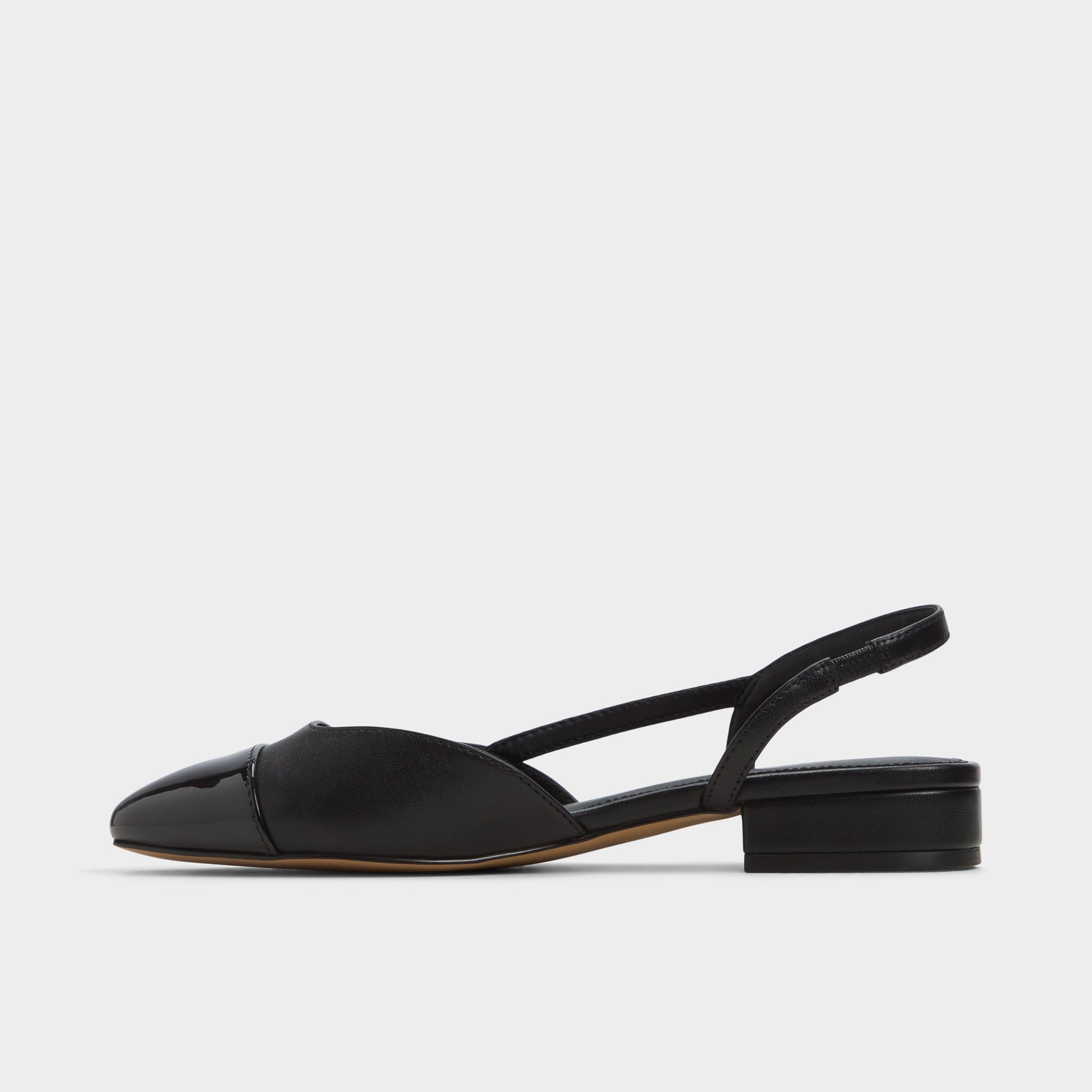 Side view of Other Black Clementinne Sling back high heel