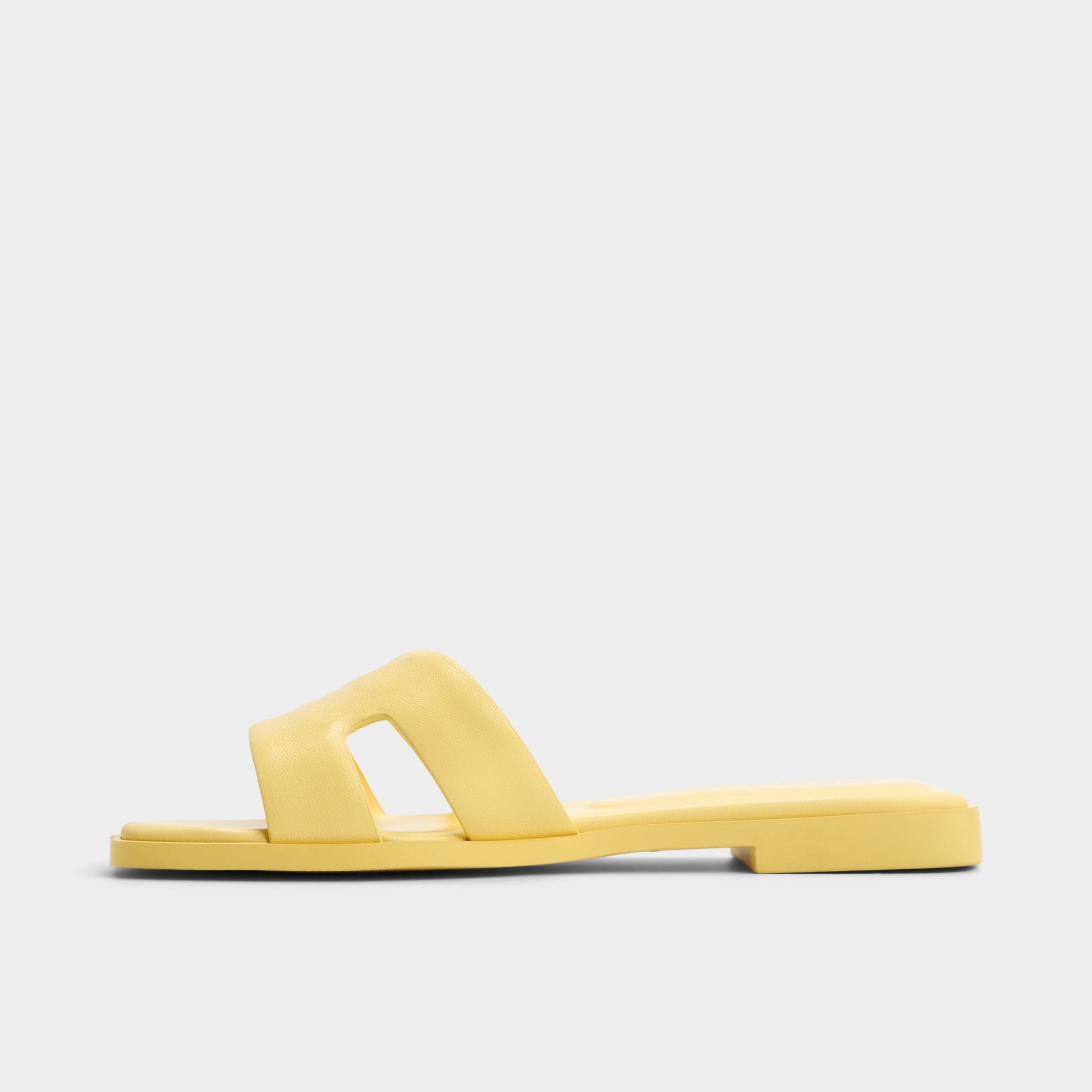 Side view of Yellow Itsandal Slide sandal
