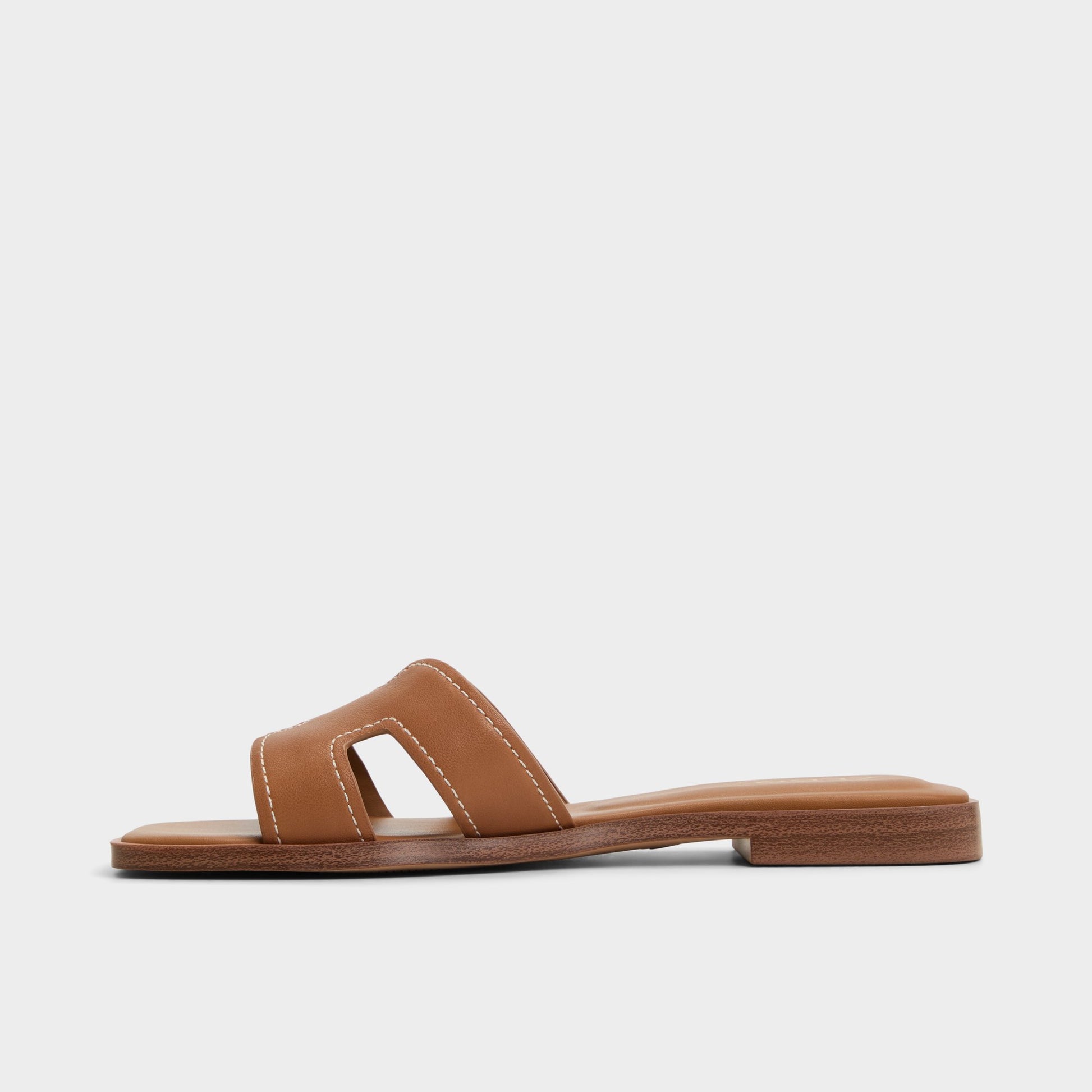 Side view of Medium brown Itsandal Slide sandal