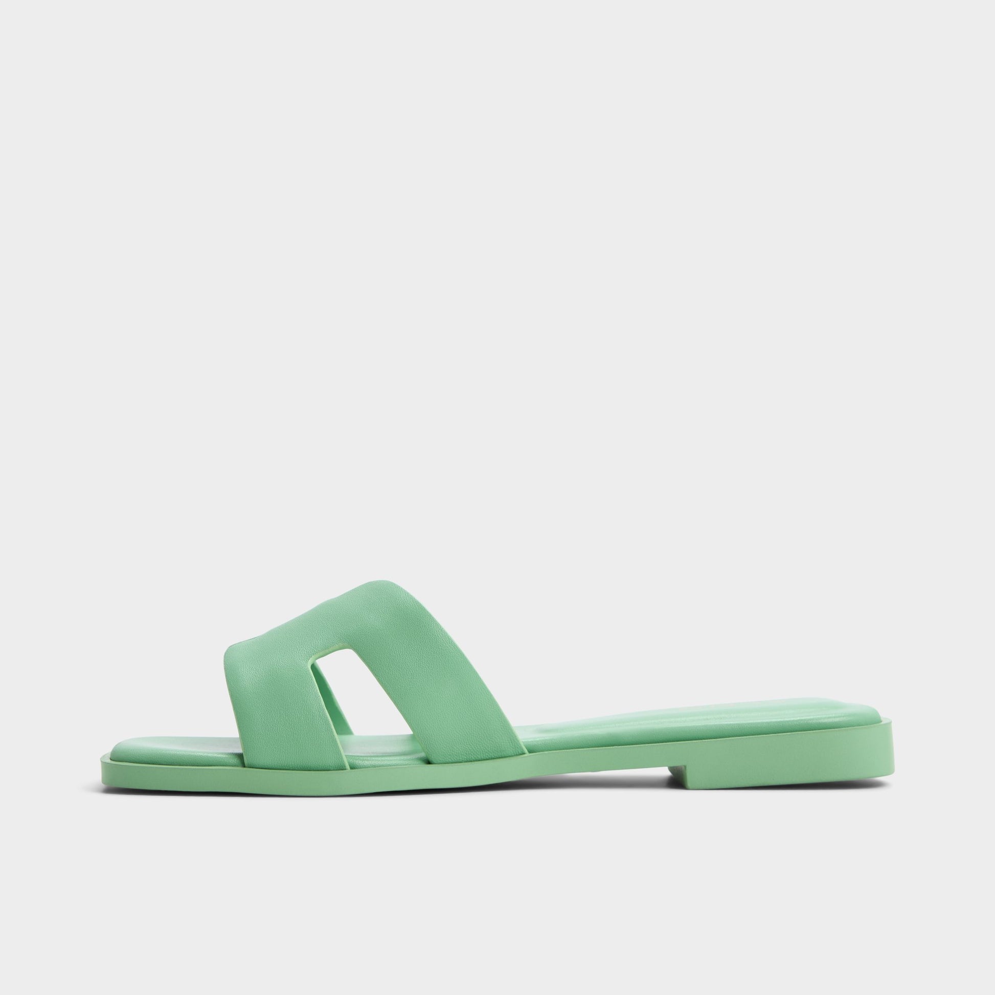 Side view of Medium Green Itsandal Slide sandal