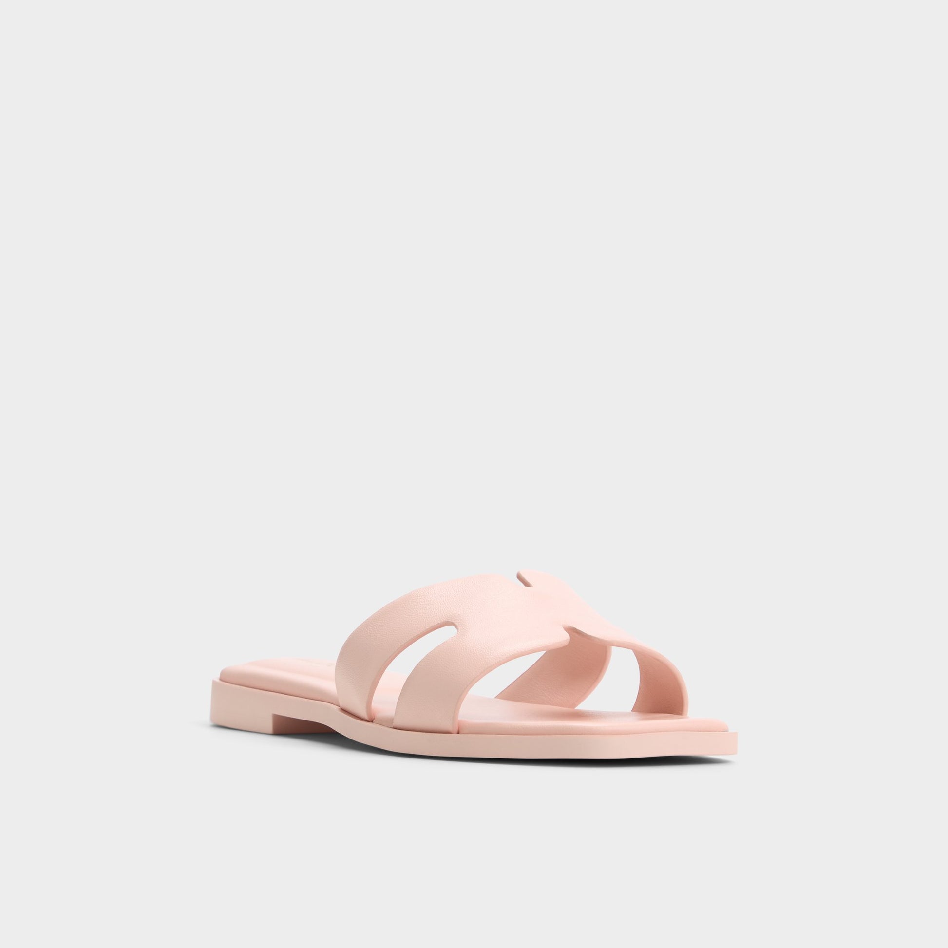 Three-quarter angle of Light Pink Itsandal Slide sandal's front side