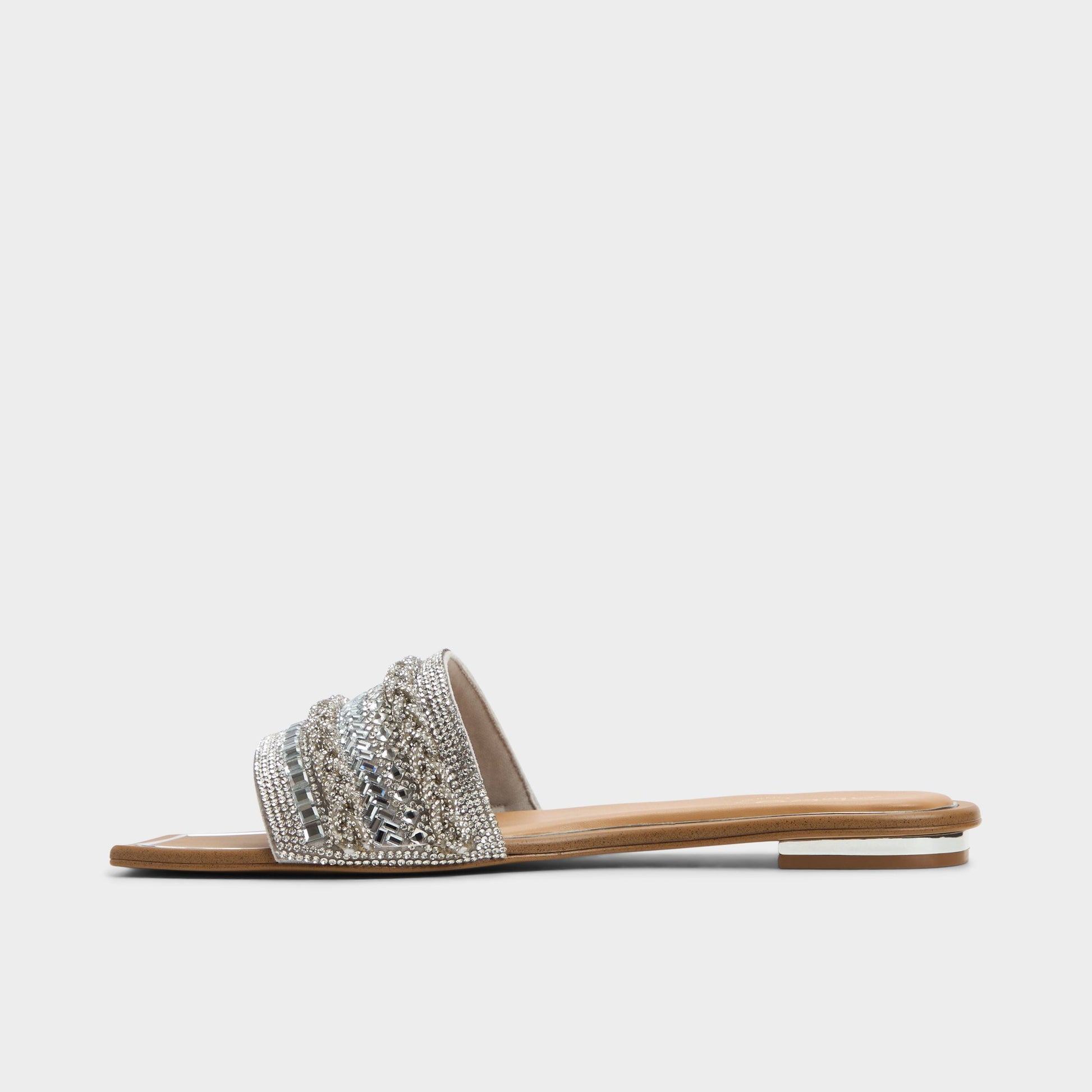 Side view of Silver Navalia Slide sandal