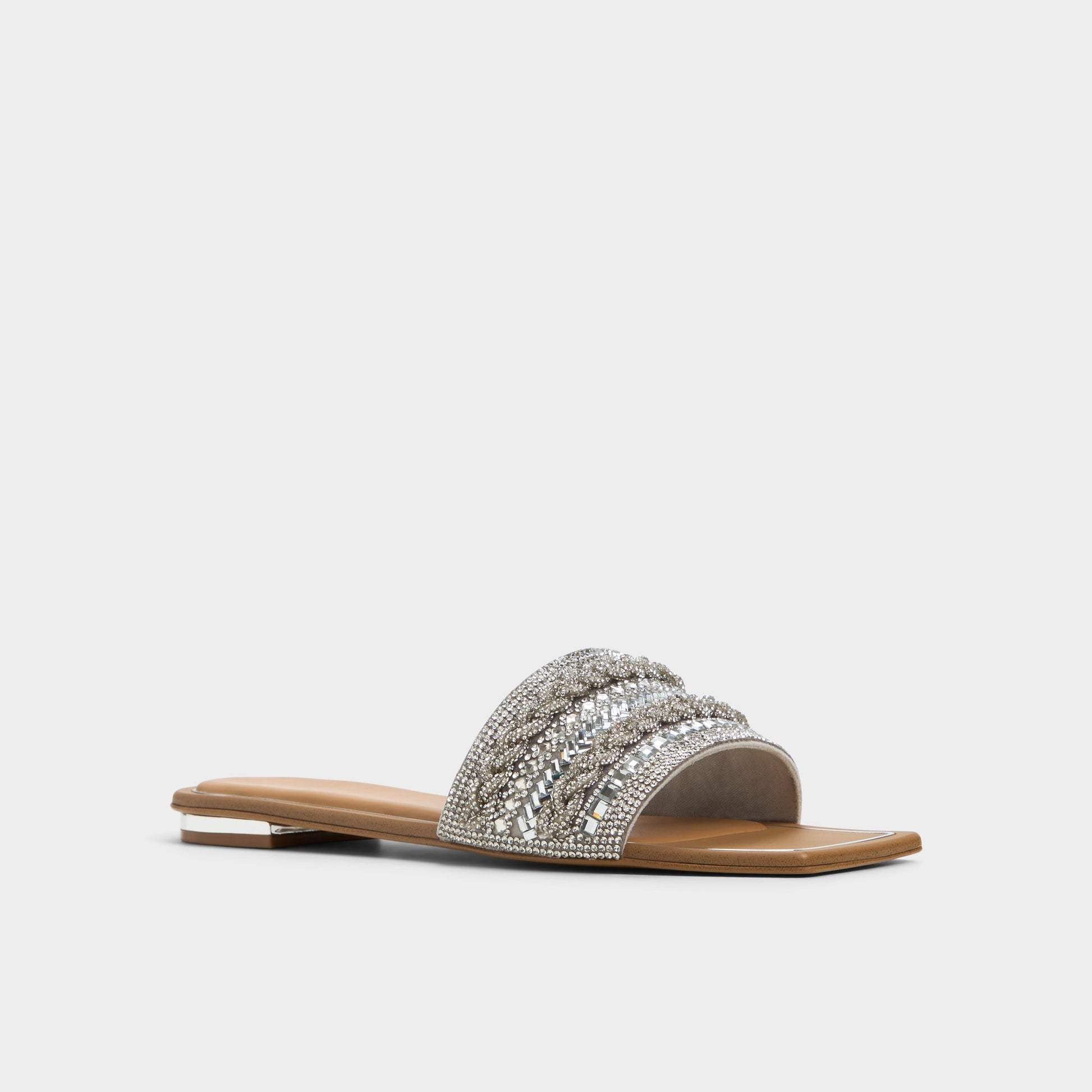 Three-quarter angle of Silver Navalia Slide sandal's front side