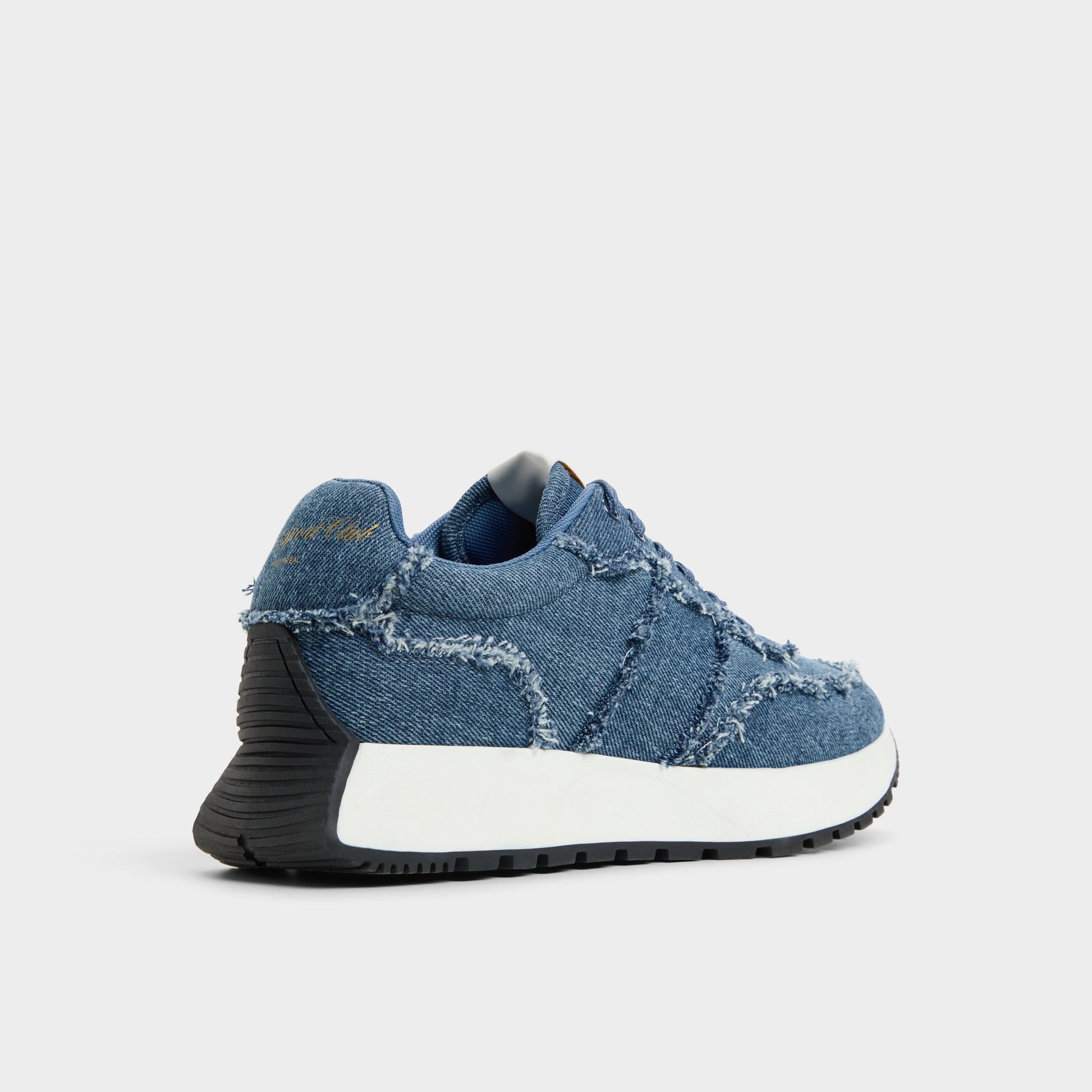 Three-quarter angle of Denim Proader Jogger sneaker's back side