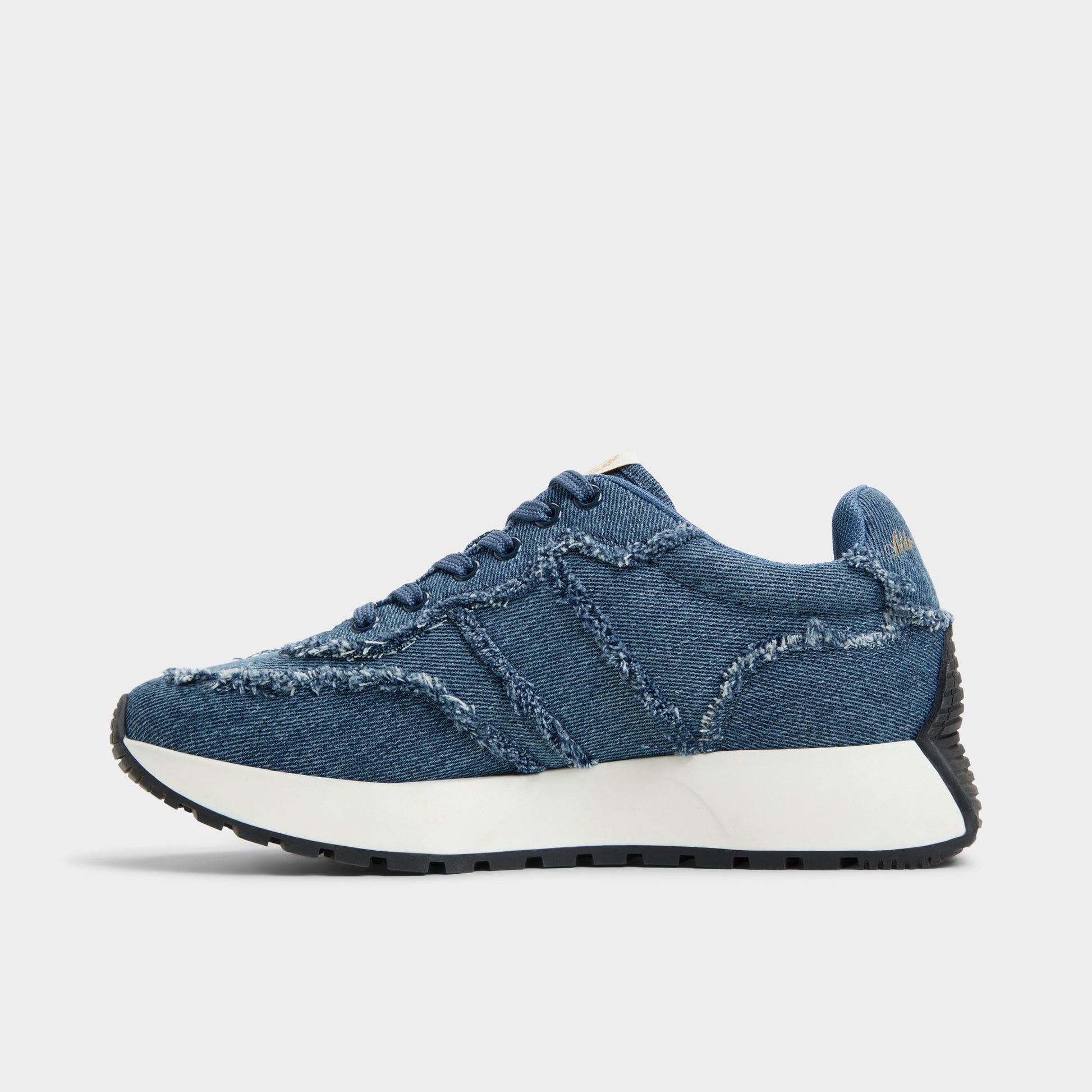 Side view of Denim Proader Jogger sneaker