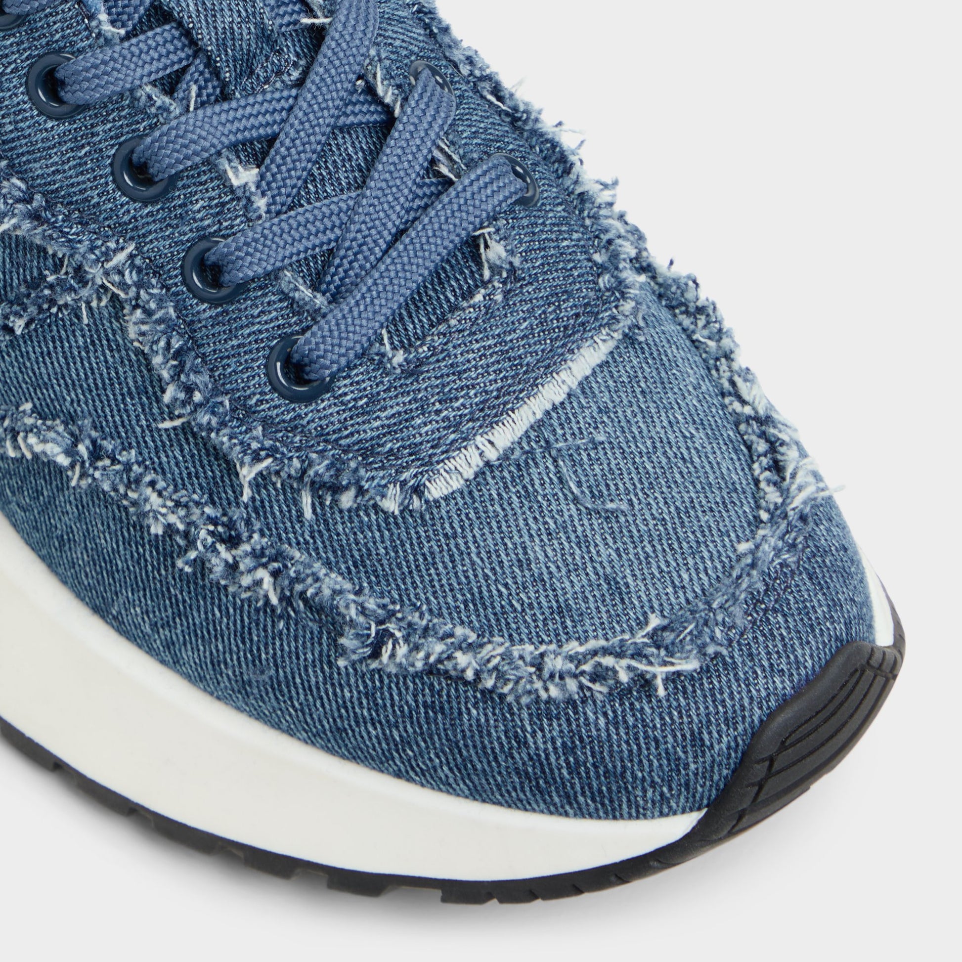 Close-up of the Denim Proader Jogger sneaker