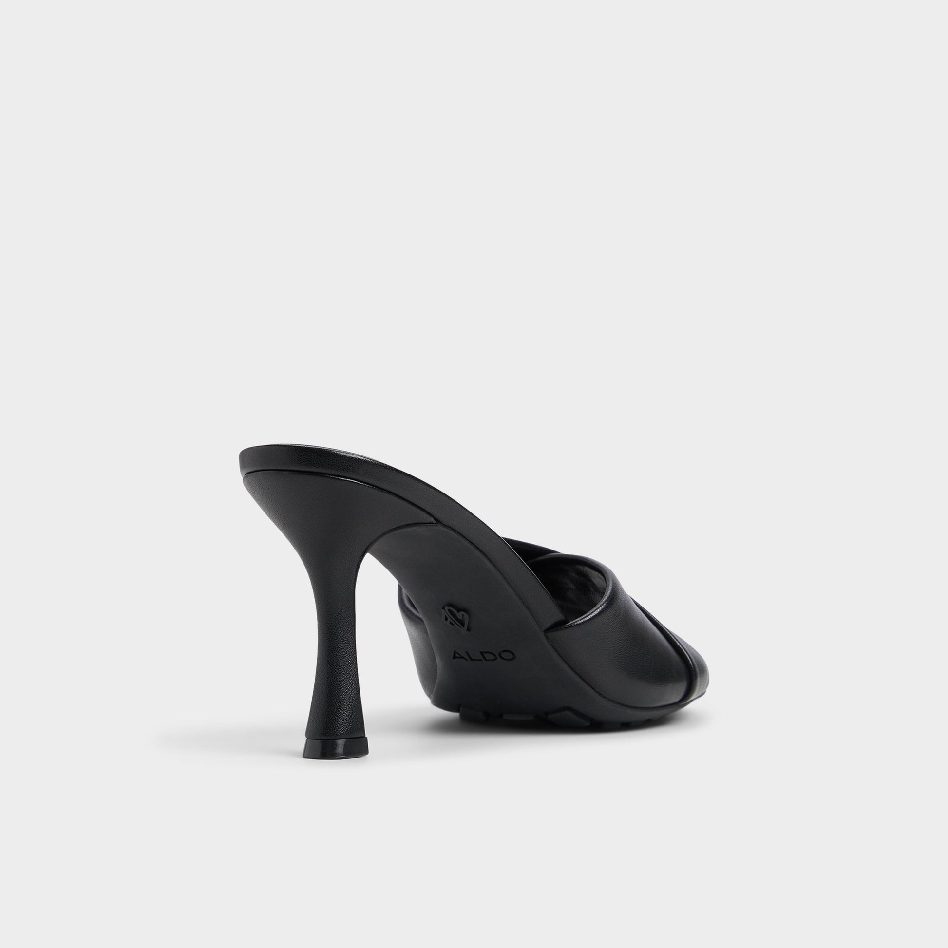 Three-quarter angle of Black Lyhanna Heeled mule's back side