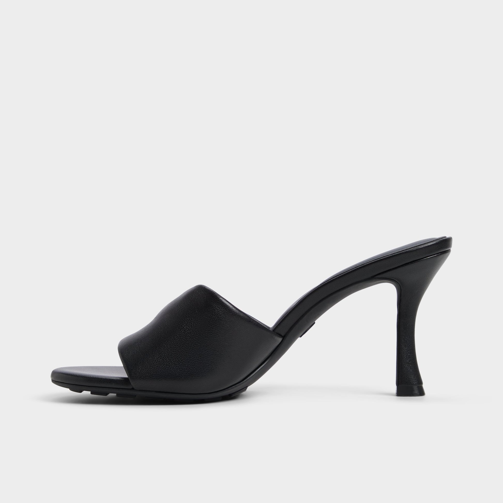 Side view of Black Lyhanna Heeled mule
