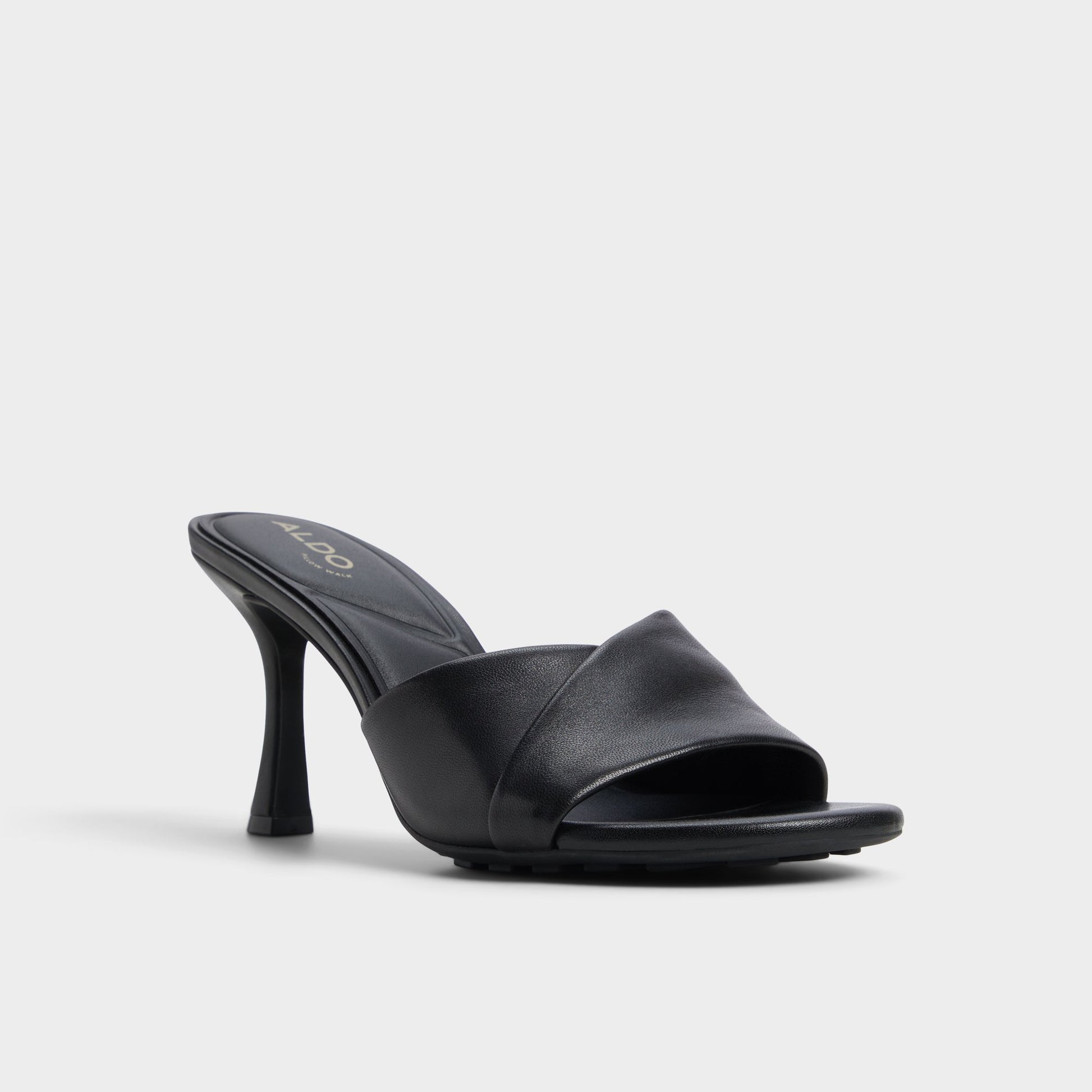 Three-quarter angle of Black Lyhanna Heeled mule's front side