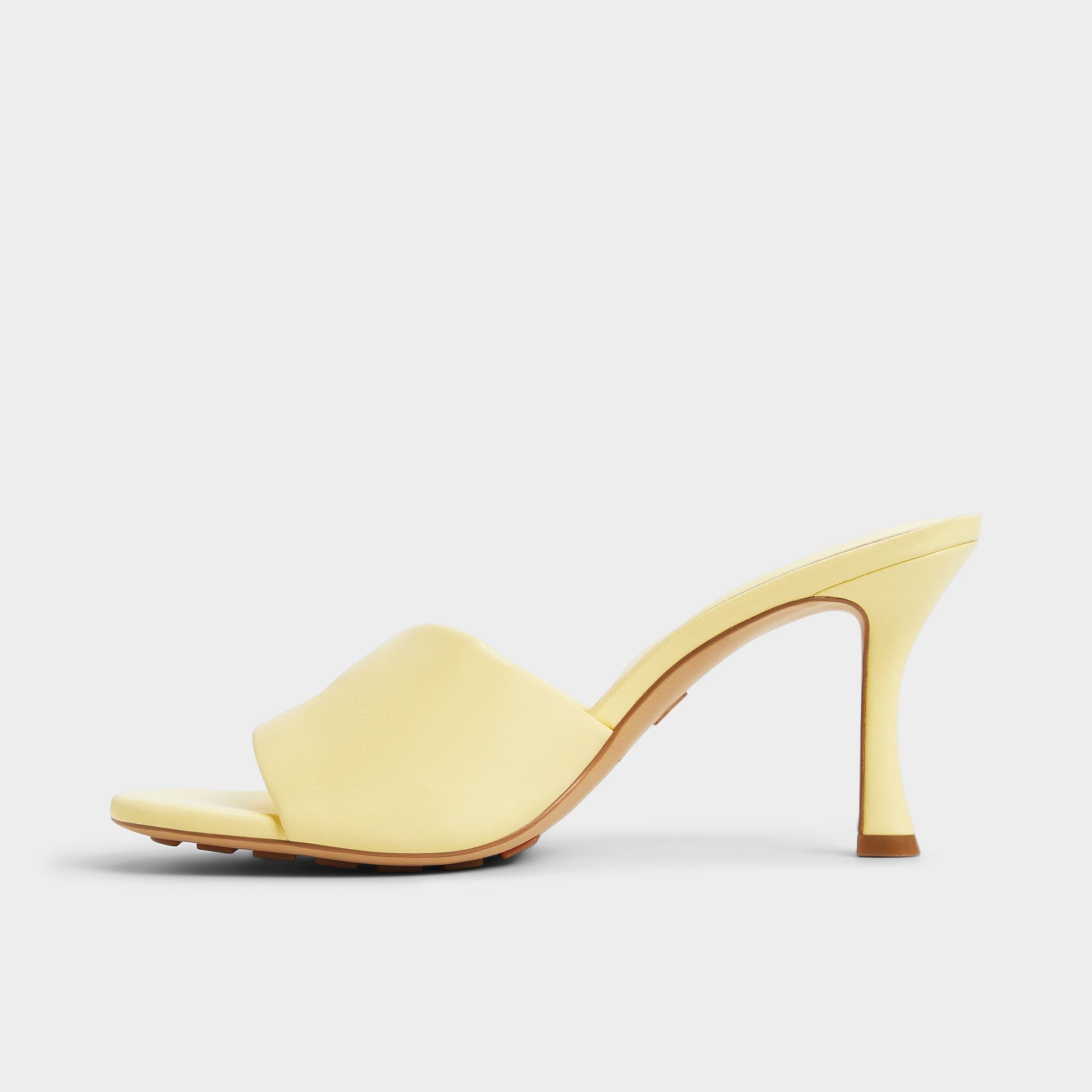 Side view of Light Yellow Lyhanna Heeled mule
