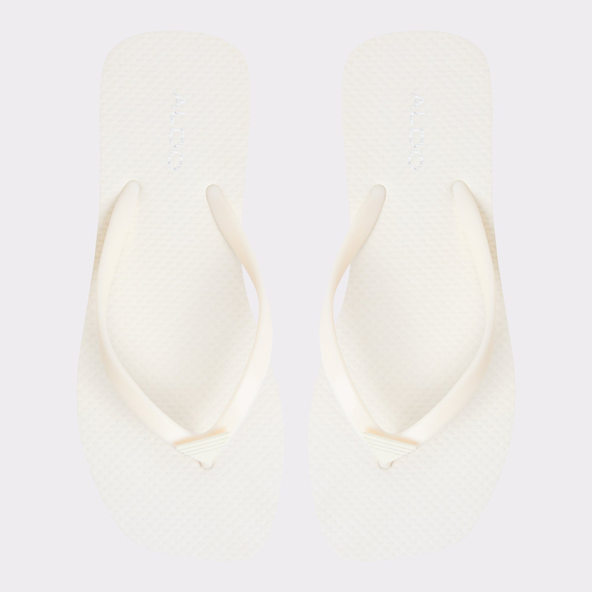 Three-quarter angle of White Beachready Flip flop's back side