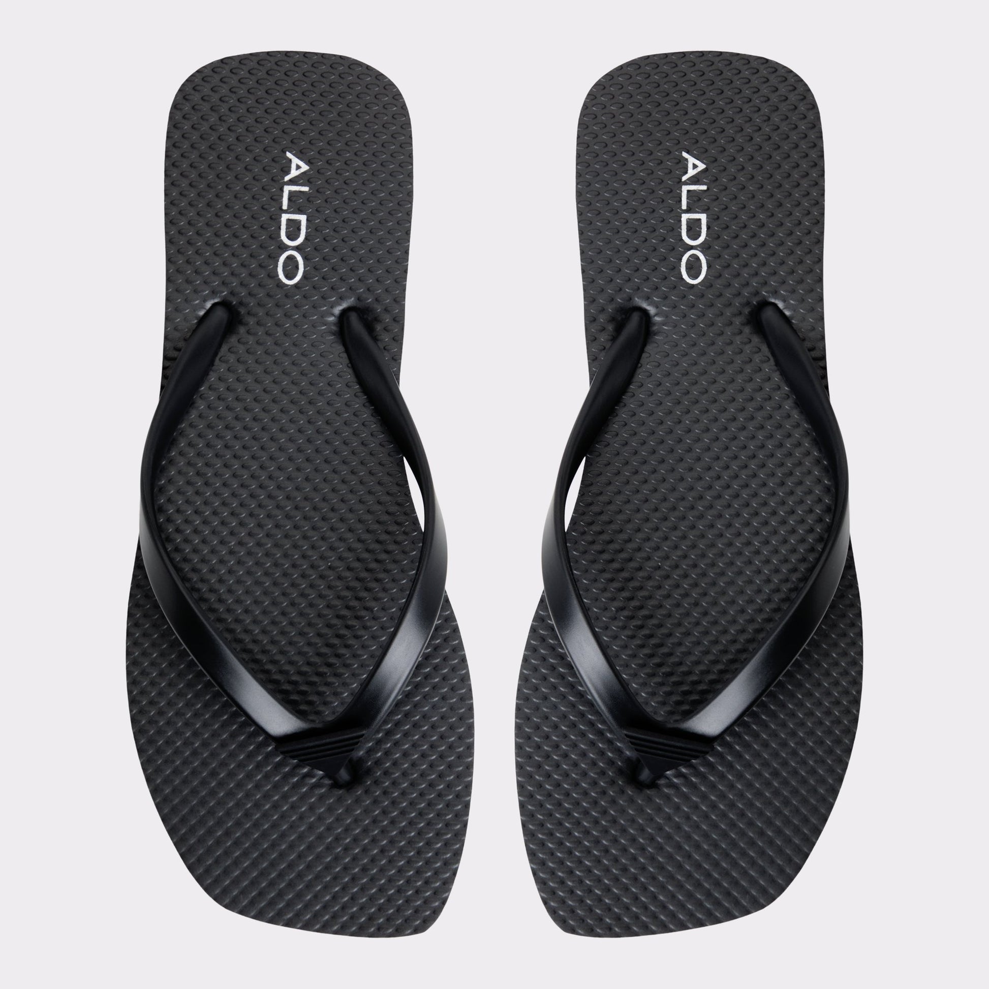 Three-quarter angle of Black Beachready Flip flop's back side