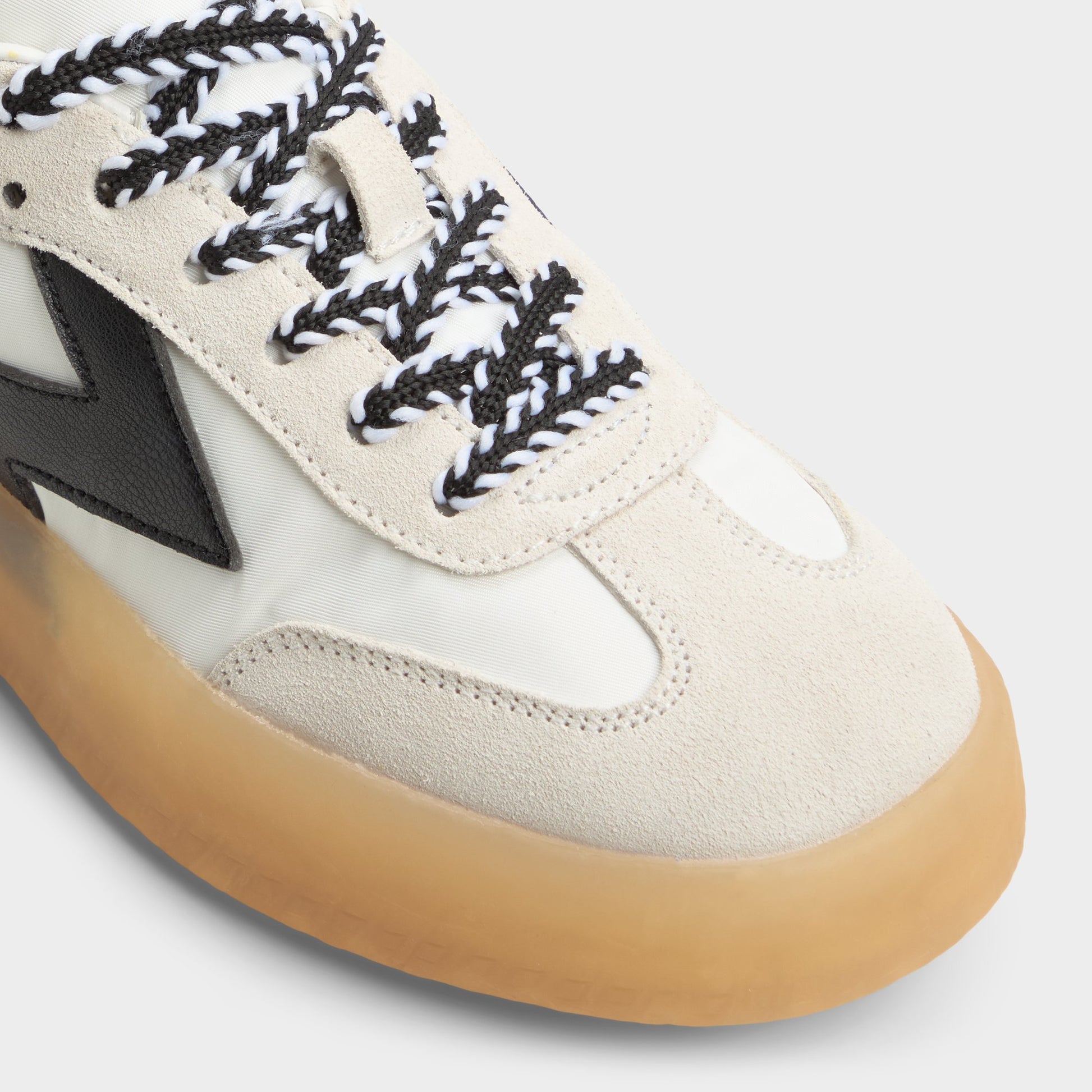 Close-up of the White/Black Retrostep Low top sneaker
