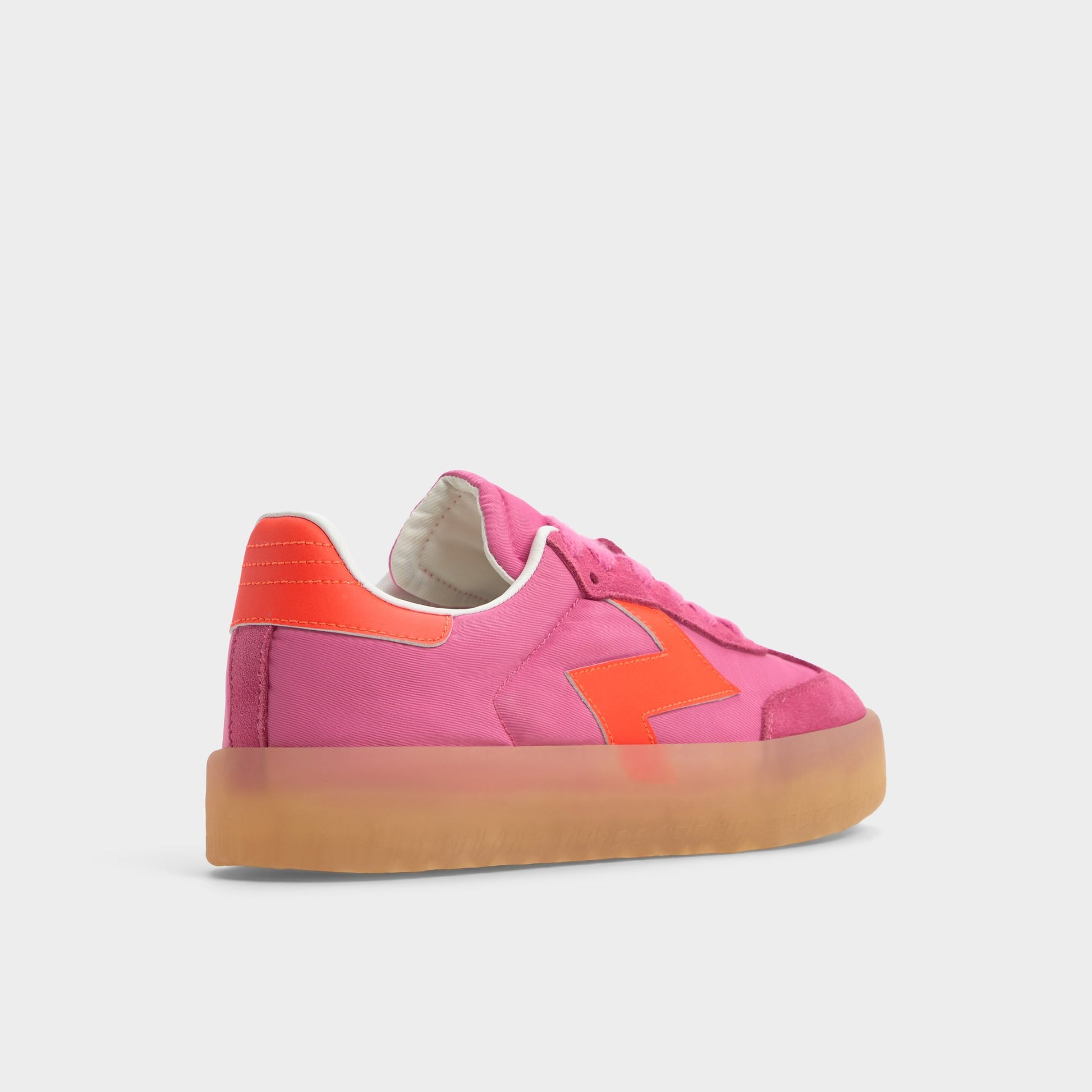 Three-quarter angle of Bright Pink Retrostep Low top sneaker's back side