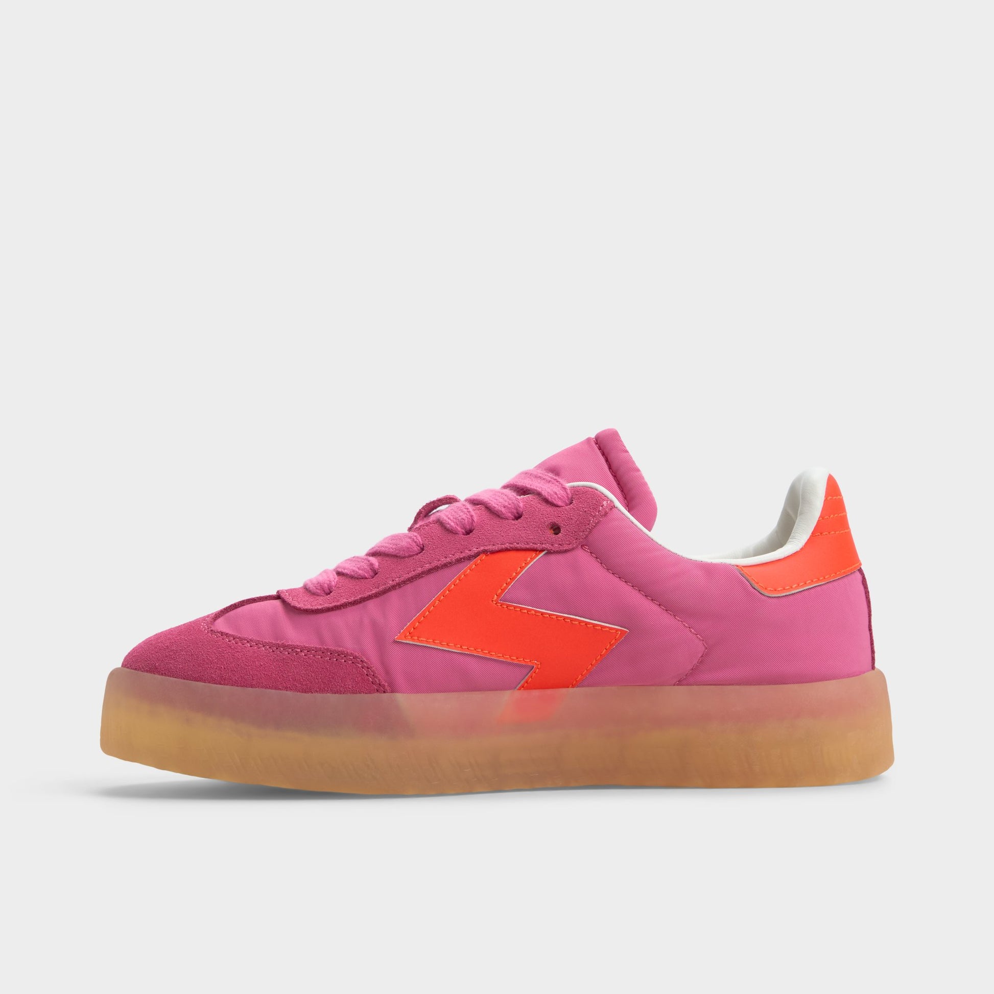 Side view of Bright Pink Retrostep Low top sneaker