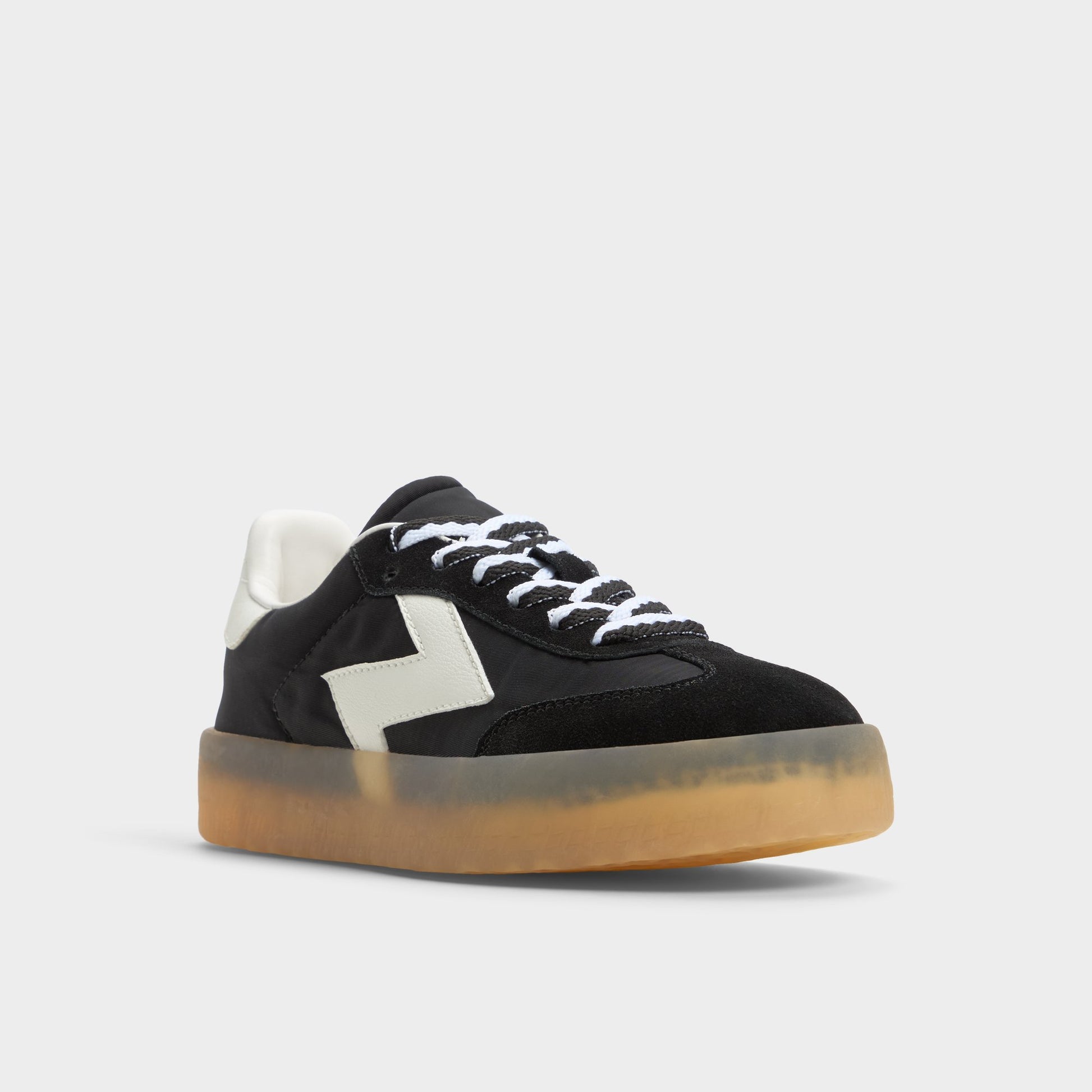 Three-quarter angle of Black Retrostep Low top sneaker's front side