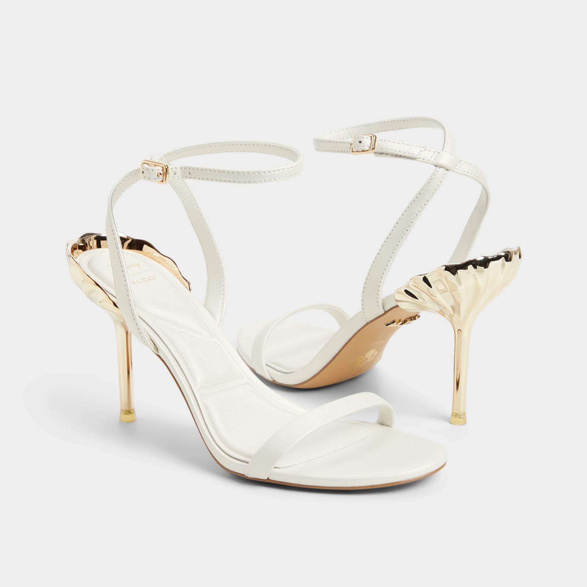 Highlighted view of a pair of White Arielheel Disney | ALDOs
