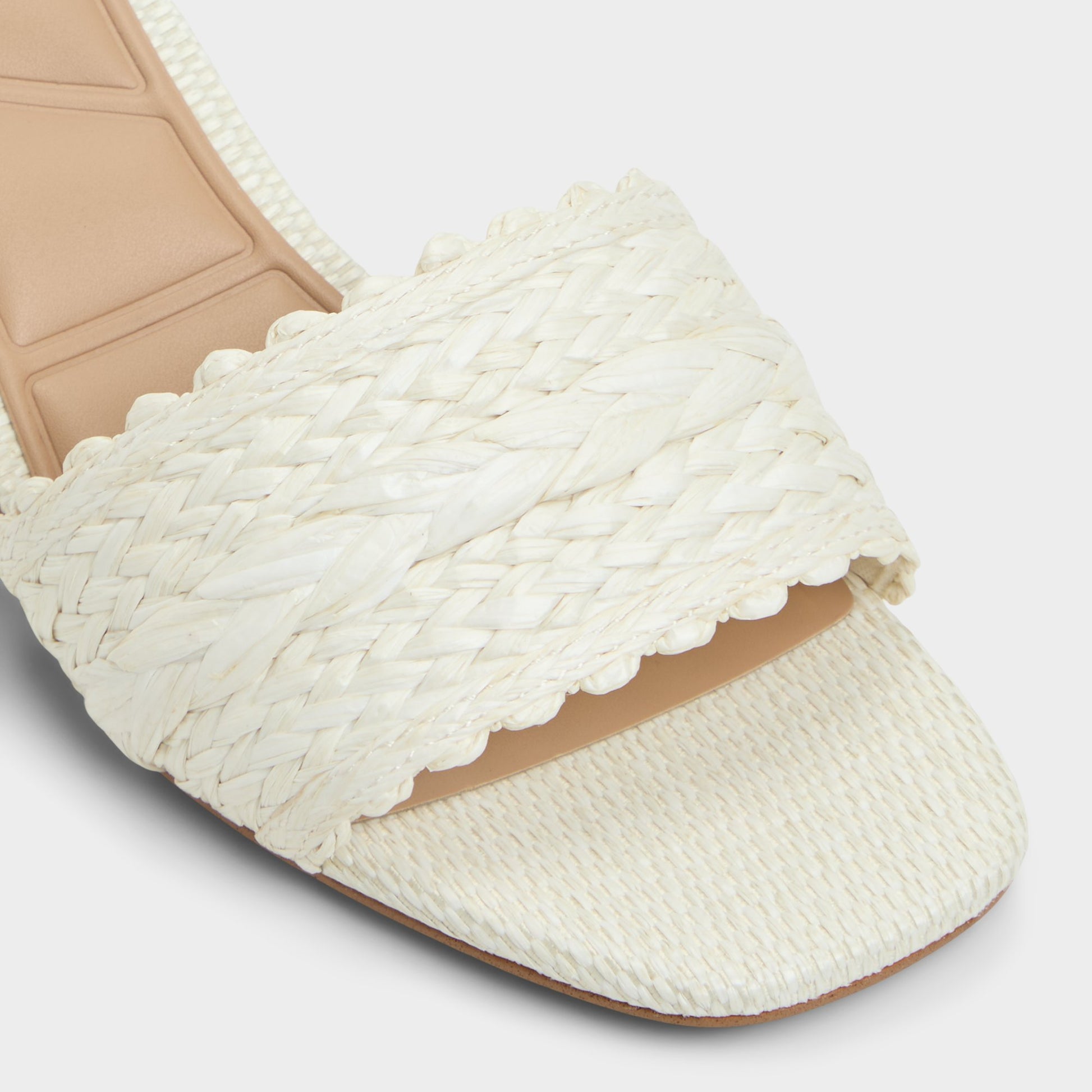 Close-up of the White/Bone Claudina Heeled mule