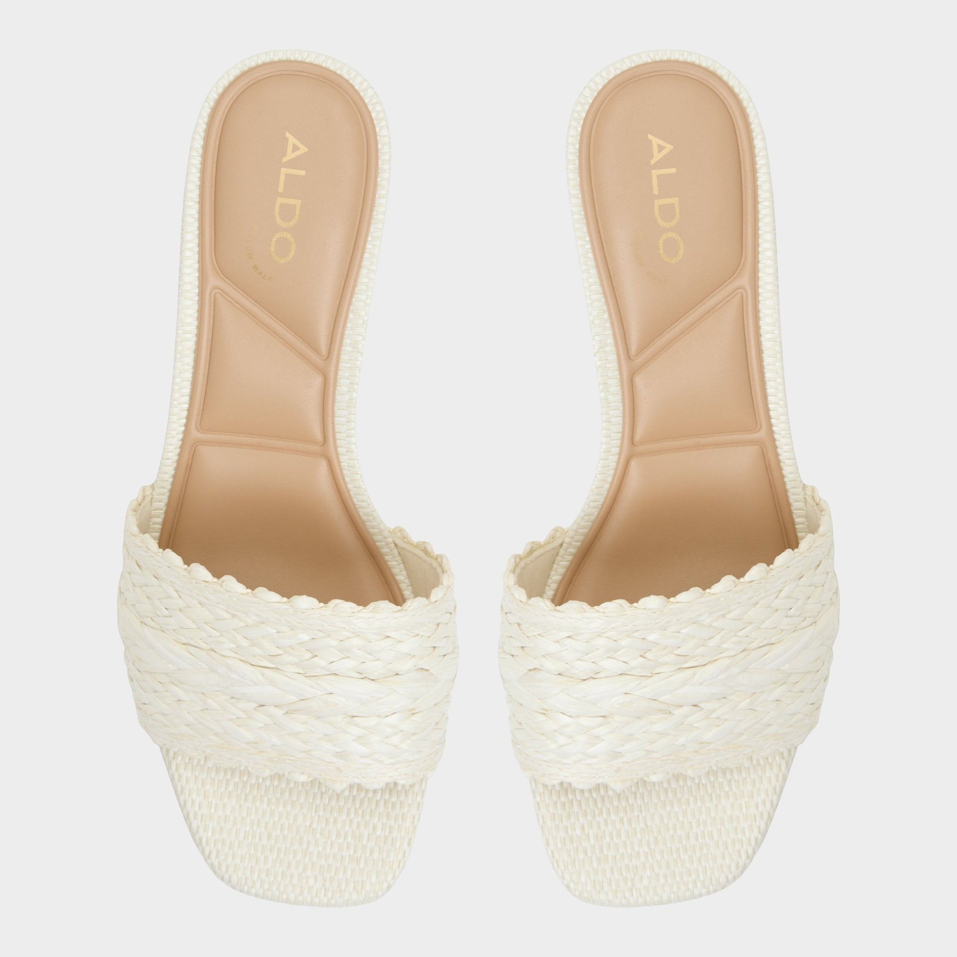 Top-down view of the White/Bone Claudina Heeled mule
