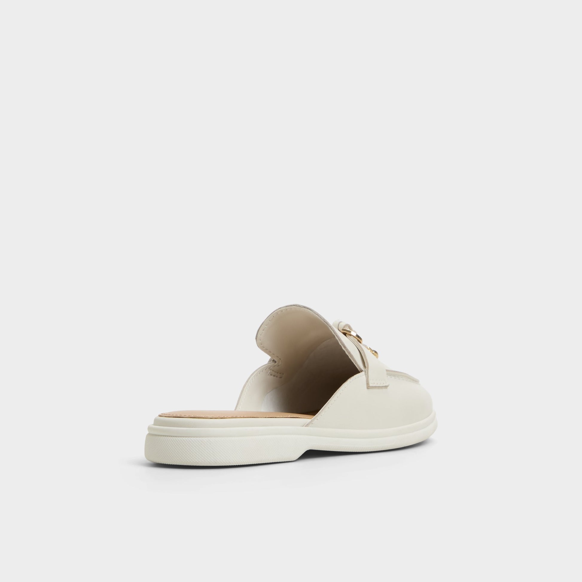 Three-quarter angle of White/Bone Kedoacien Mule's back side