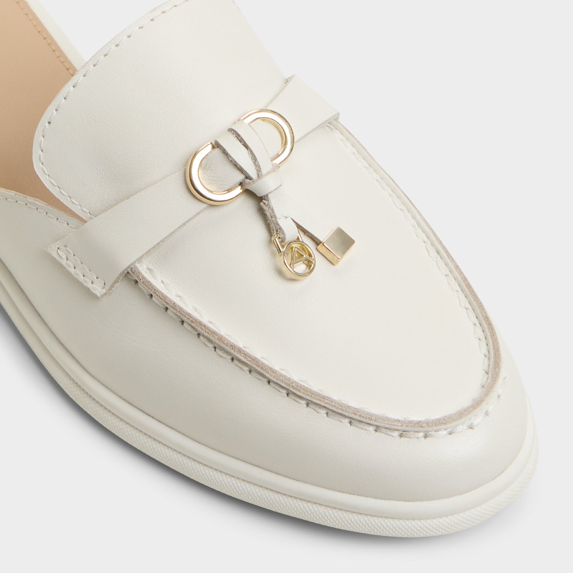 Close-up of the White/Bone Kedoacien Mule