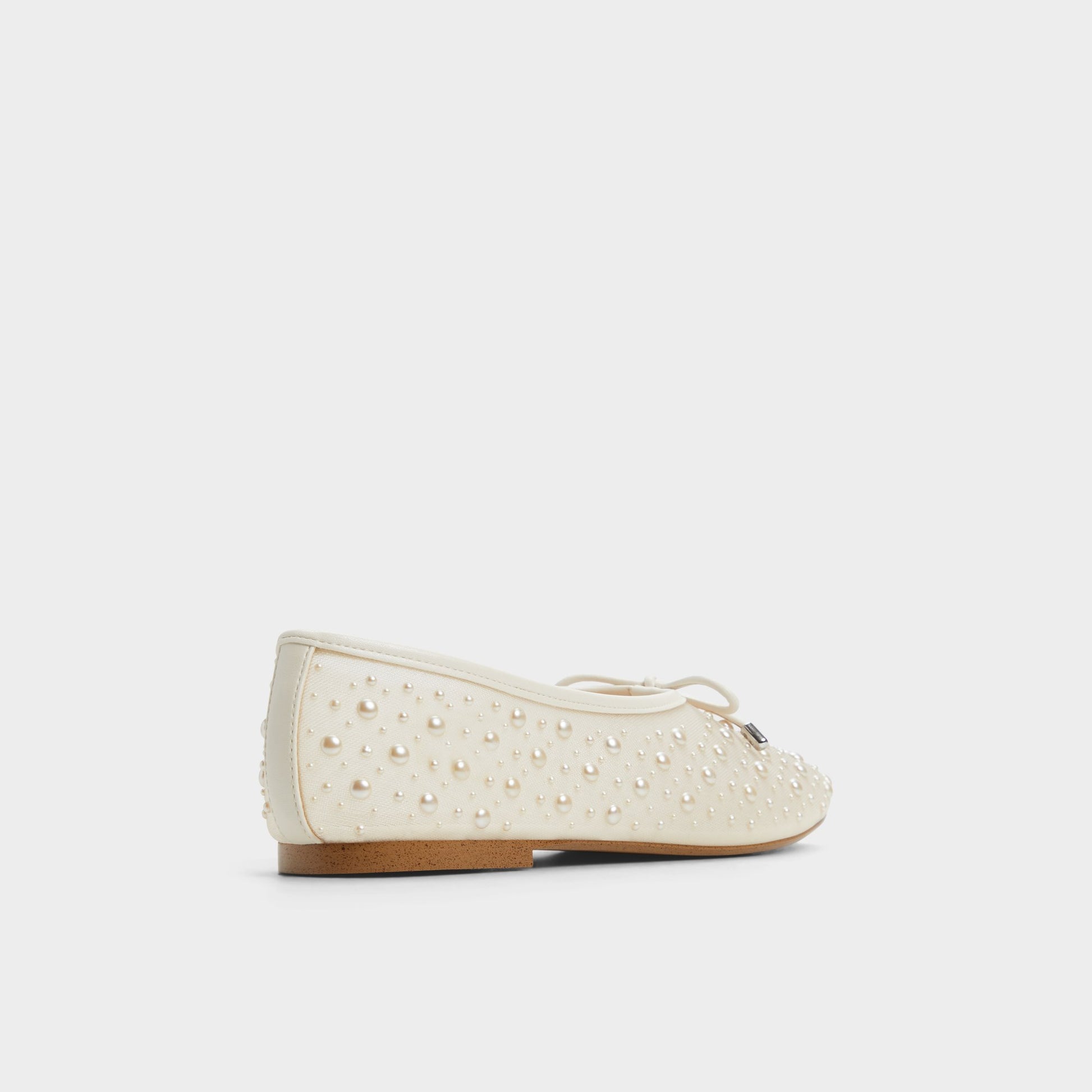 Three-quarter angle of White/Bone Joselie Ballerina's back side