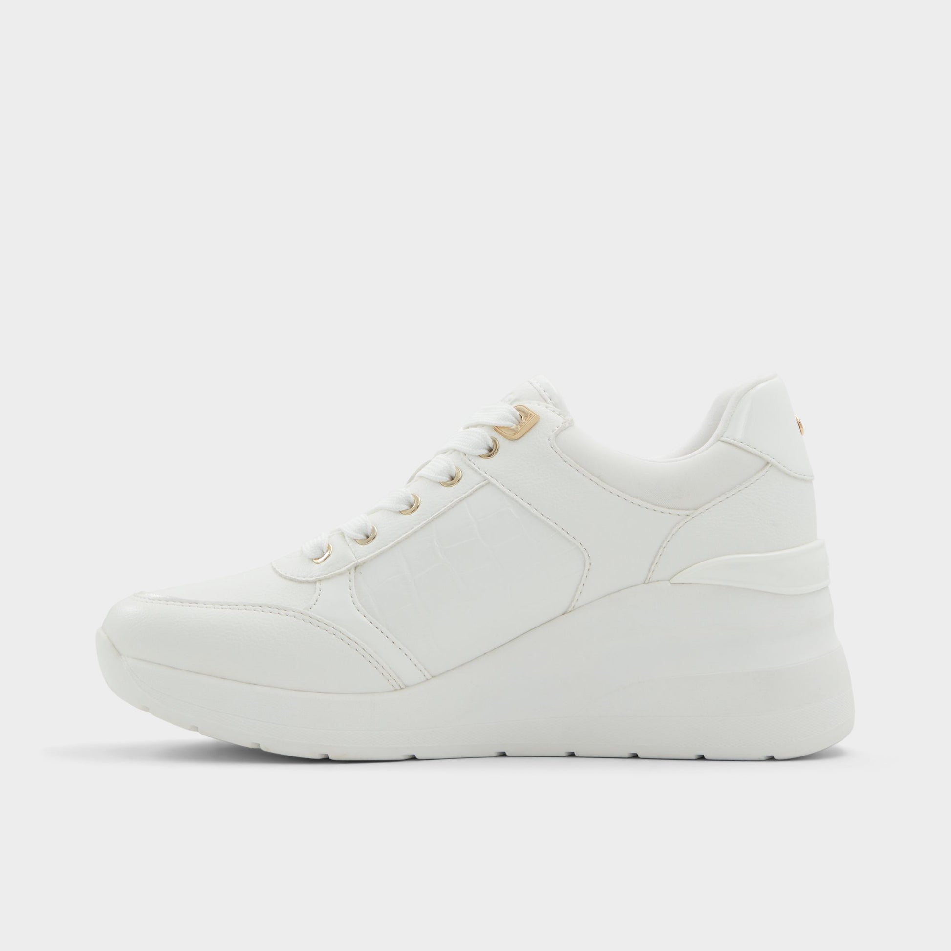 Side view of White overflow Iconistep Wedge sneaker