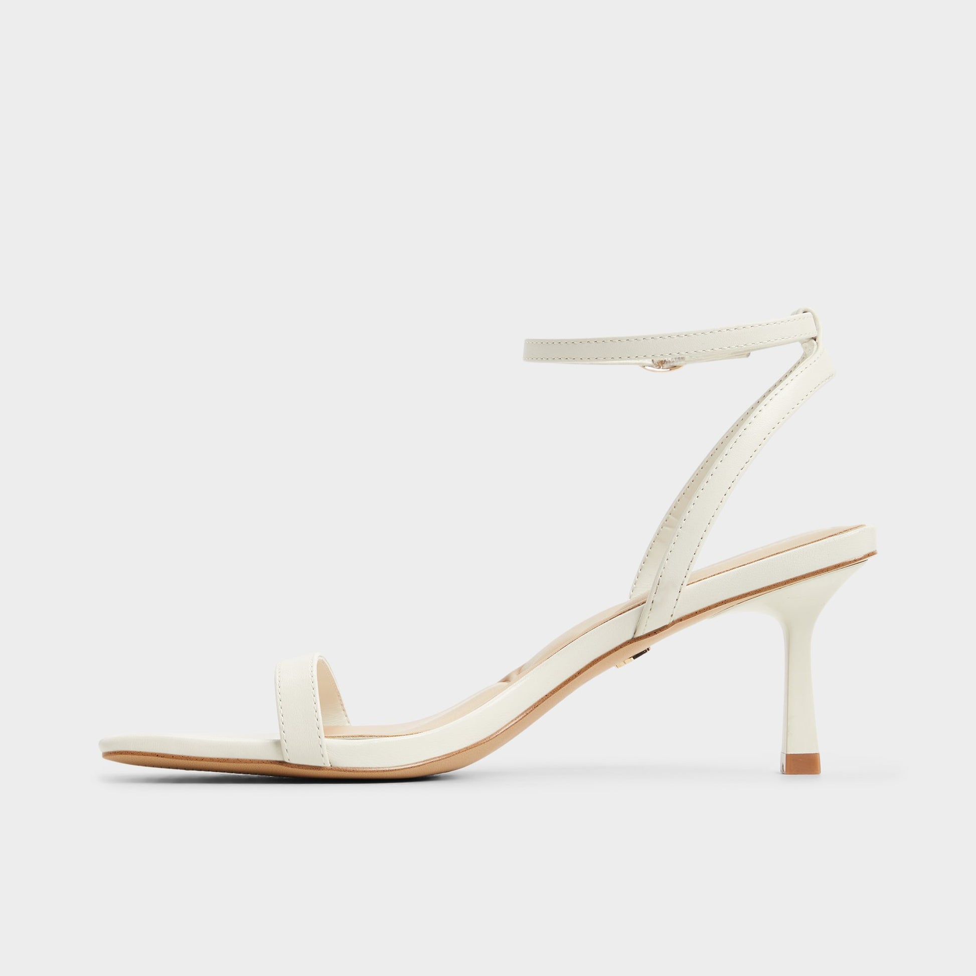 Side view of White/Bone Kirri Strappy heeled sandal
