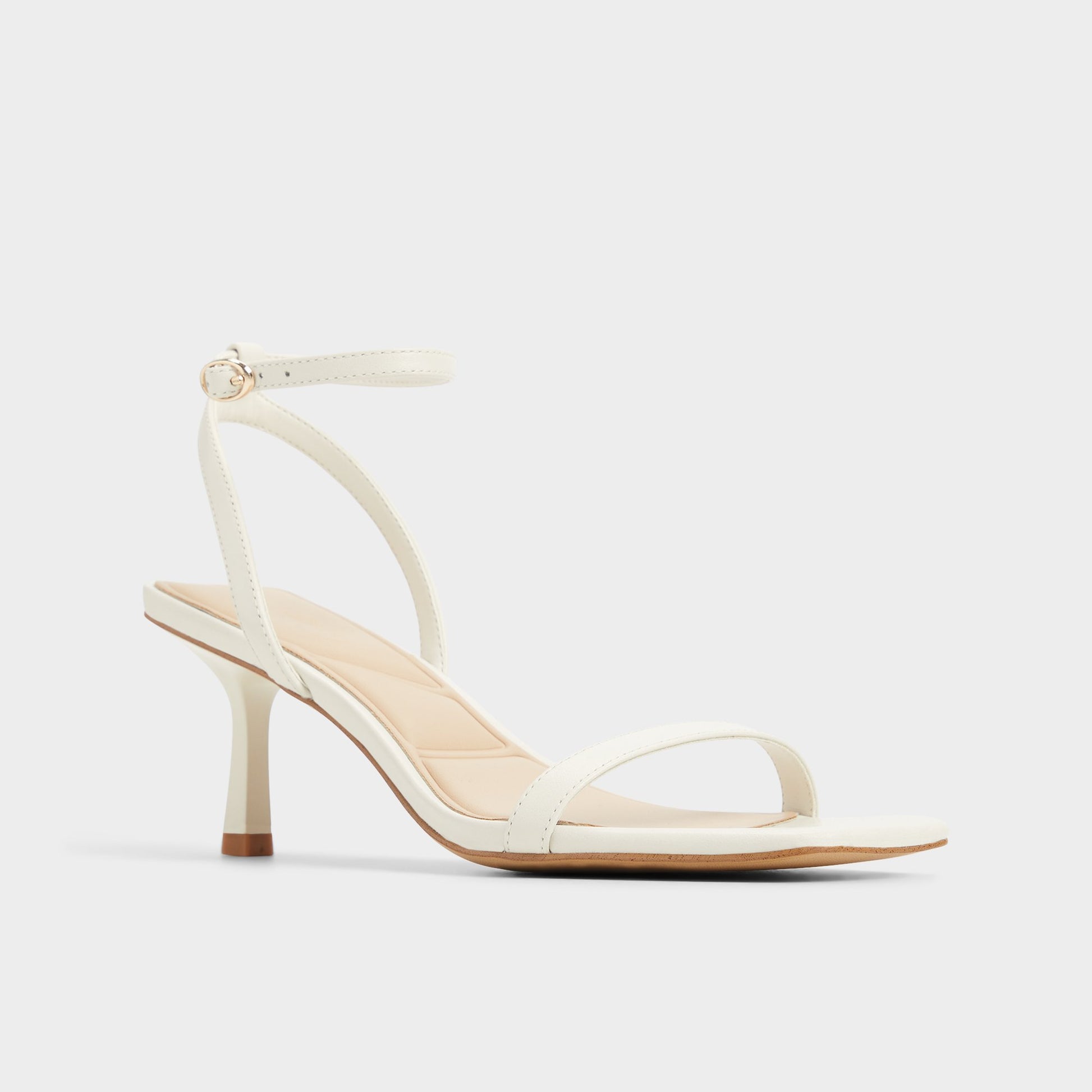 Three-quarter angle of White/Bone Kirri Strappy heeled sandal's front side