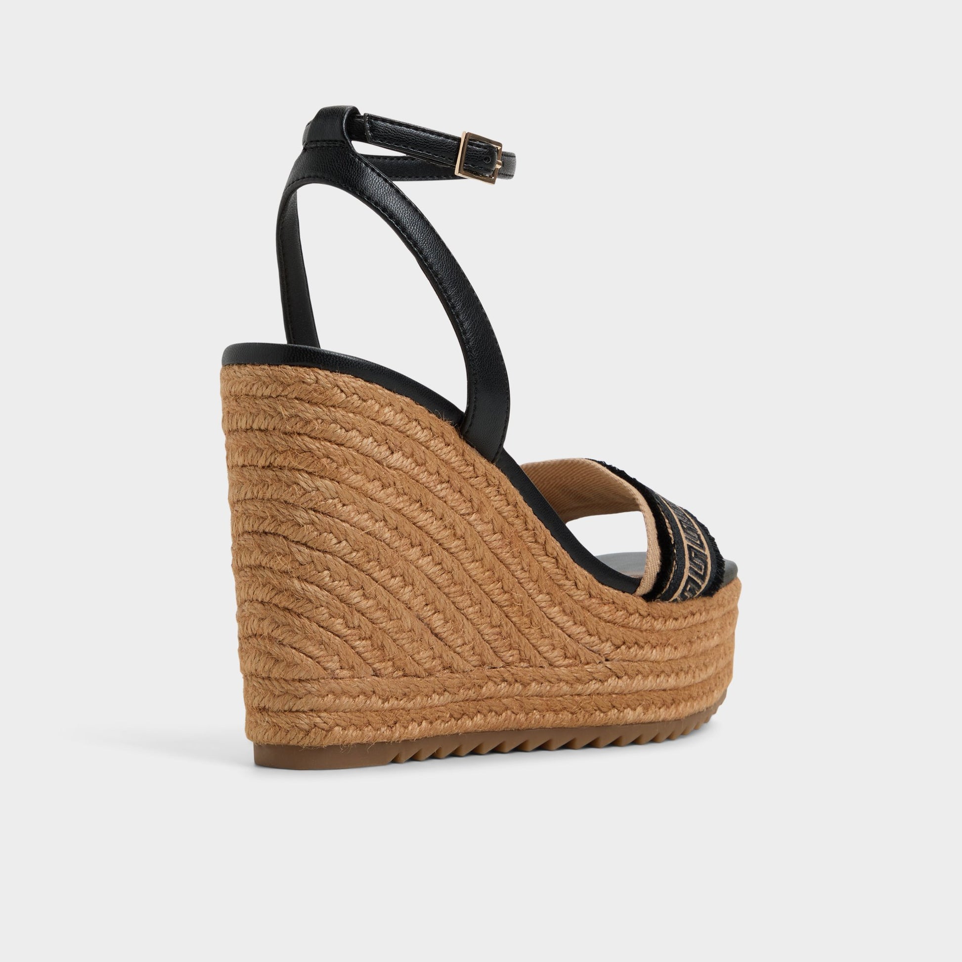 Three-quarter angle of Natural Aberitram Wedge sandal's back side