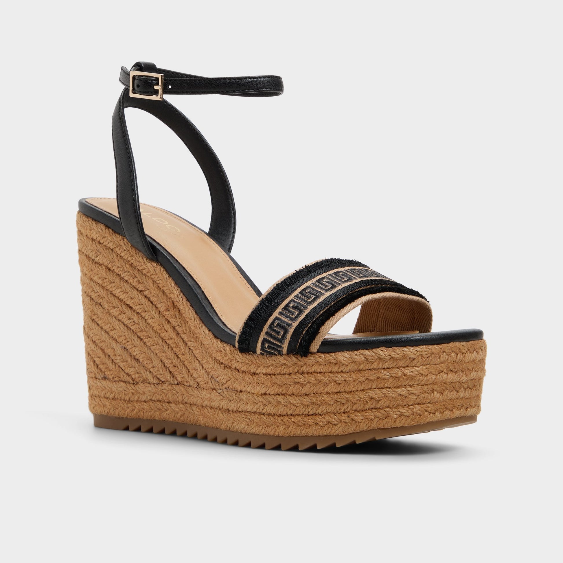Three-quarter angle of Natural Aberitram Wedge sandal's front side