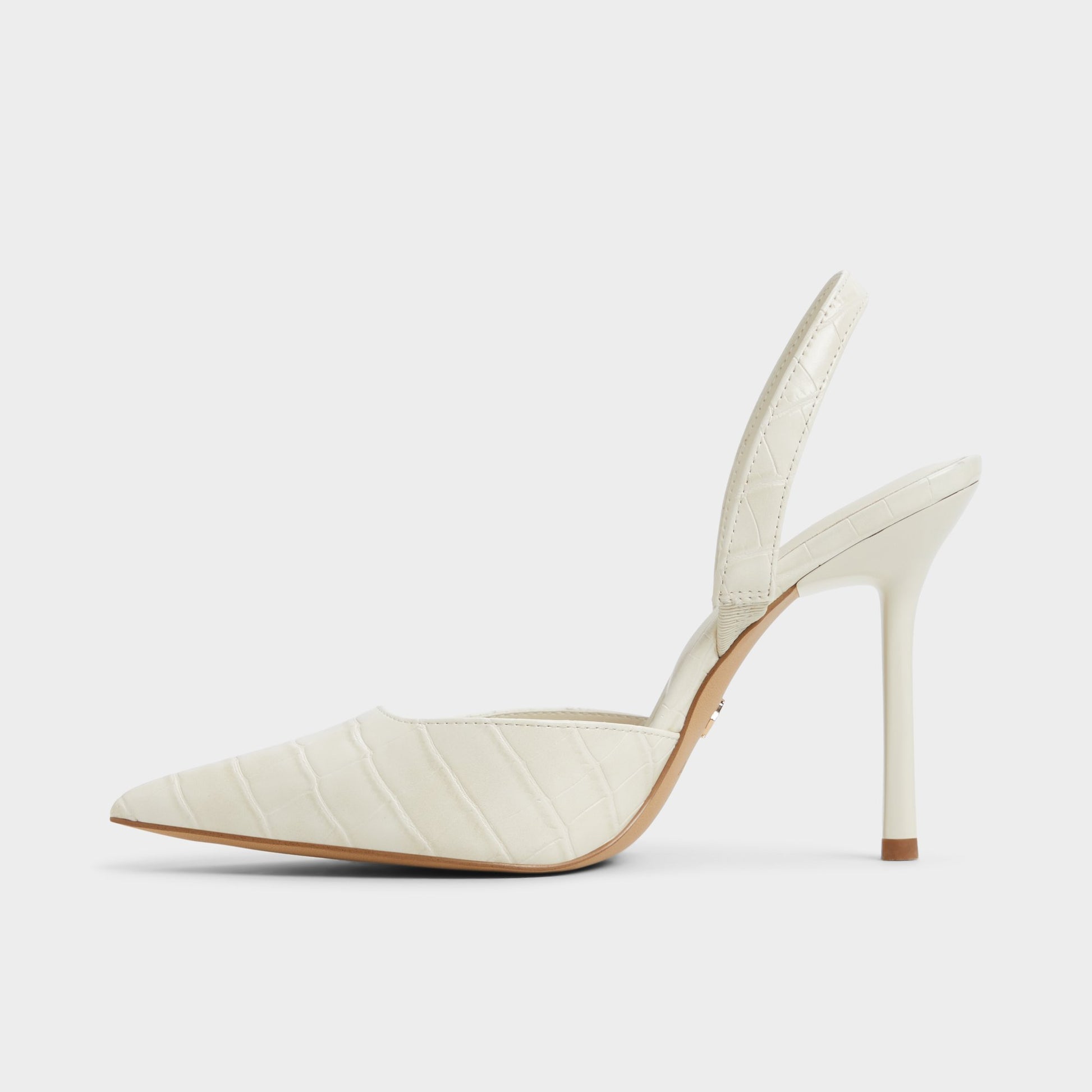 Side view of Other White Berolden Slingback heel