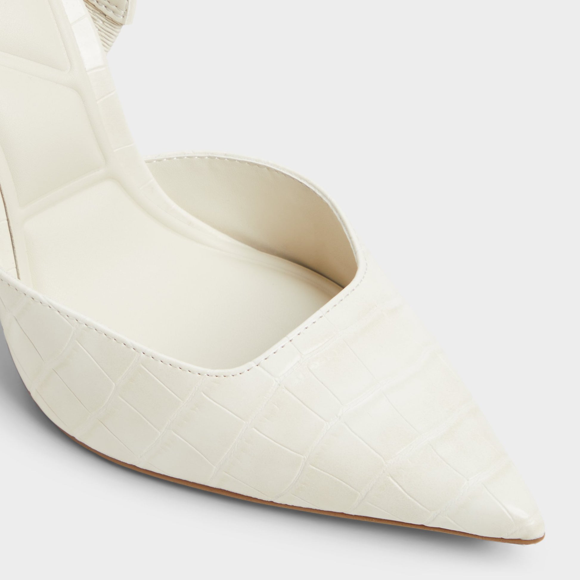 Close-up of the Other White Berolden Slingback heel