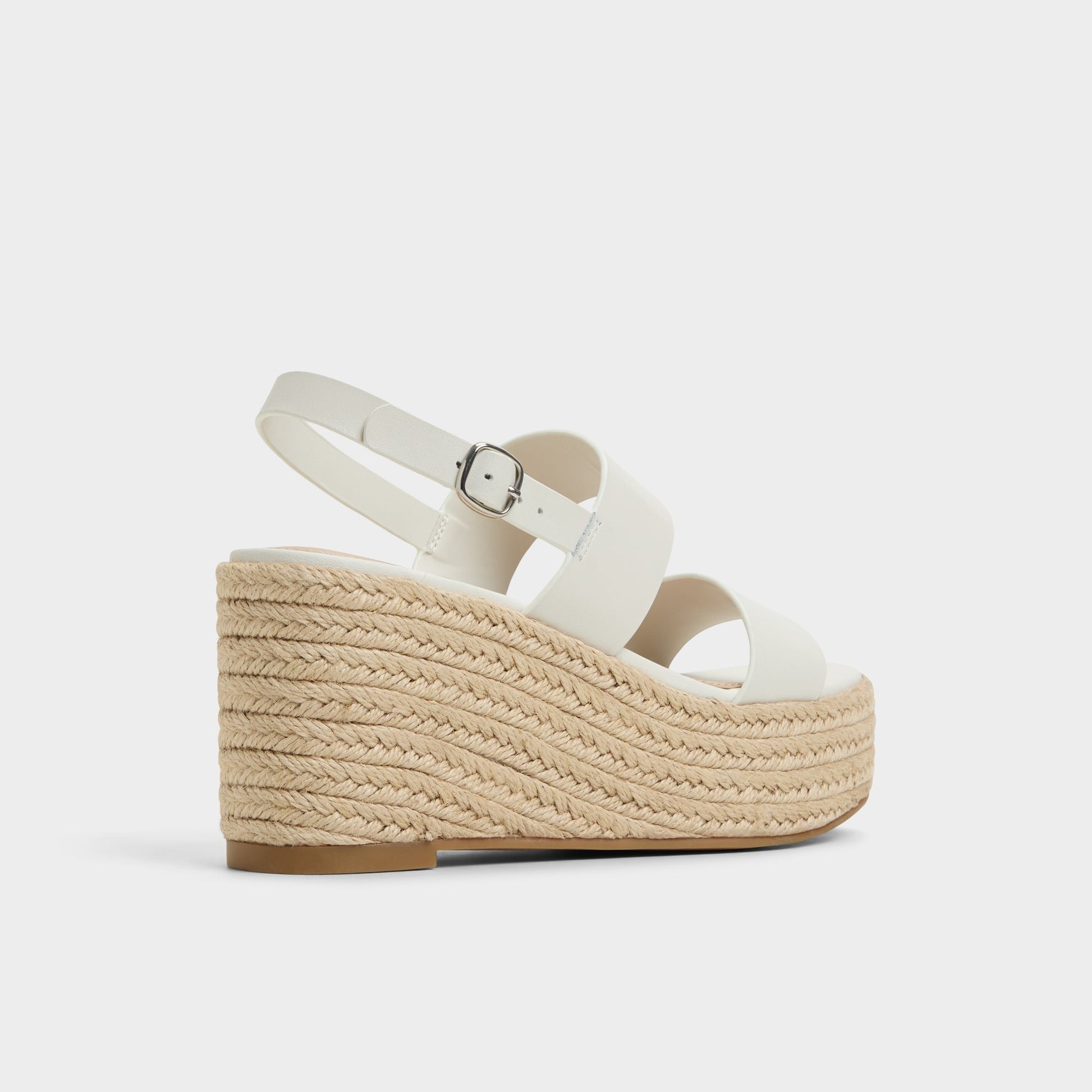 Three-quarter angle of Open White Keoni Wedge sandal's back side