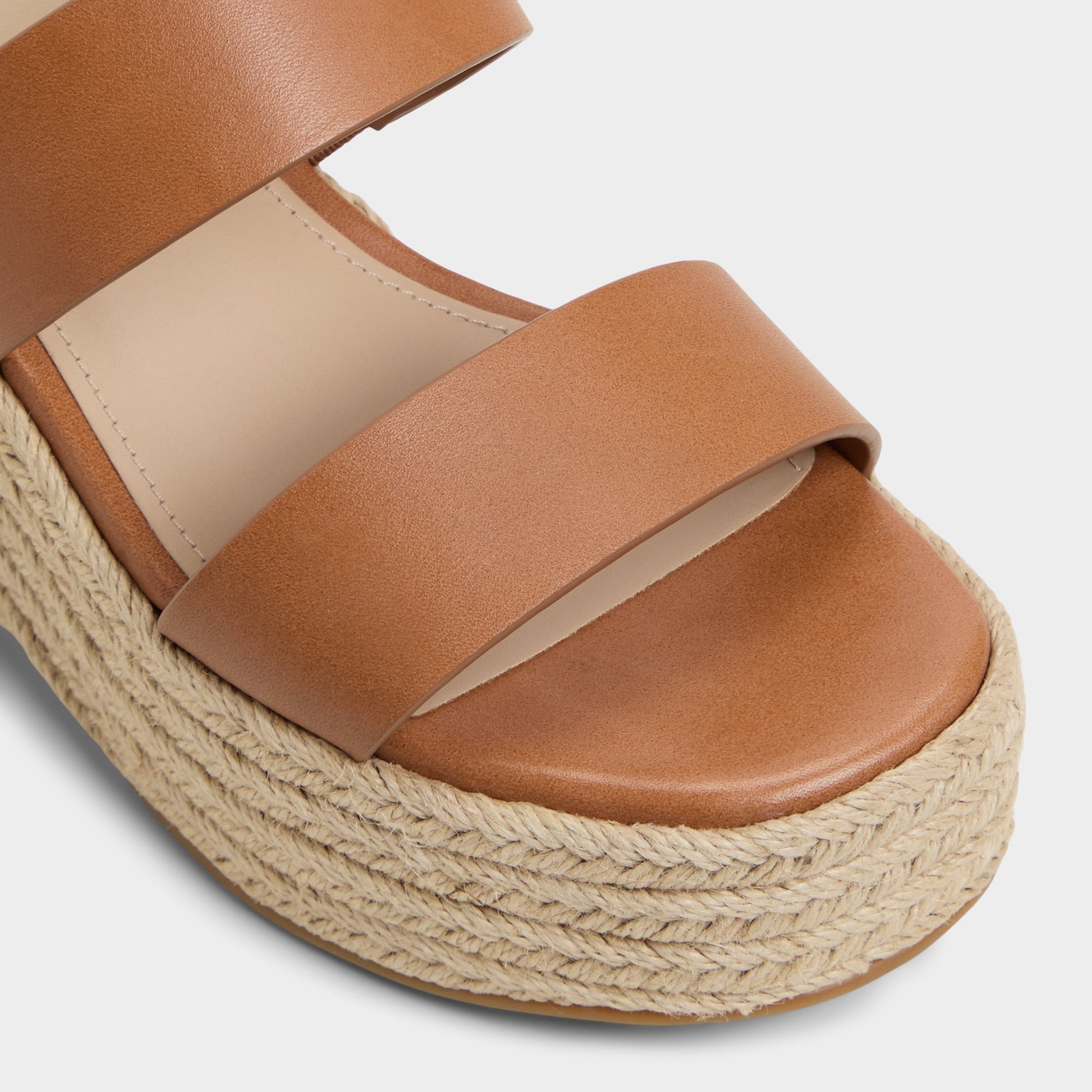 Close-up of the Medium Brown Keoni Wedge sandal