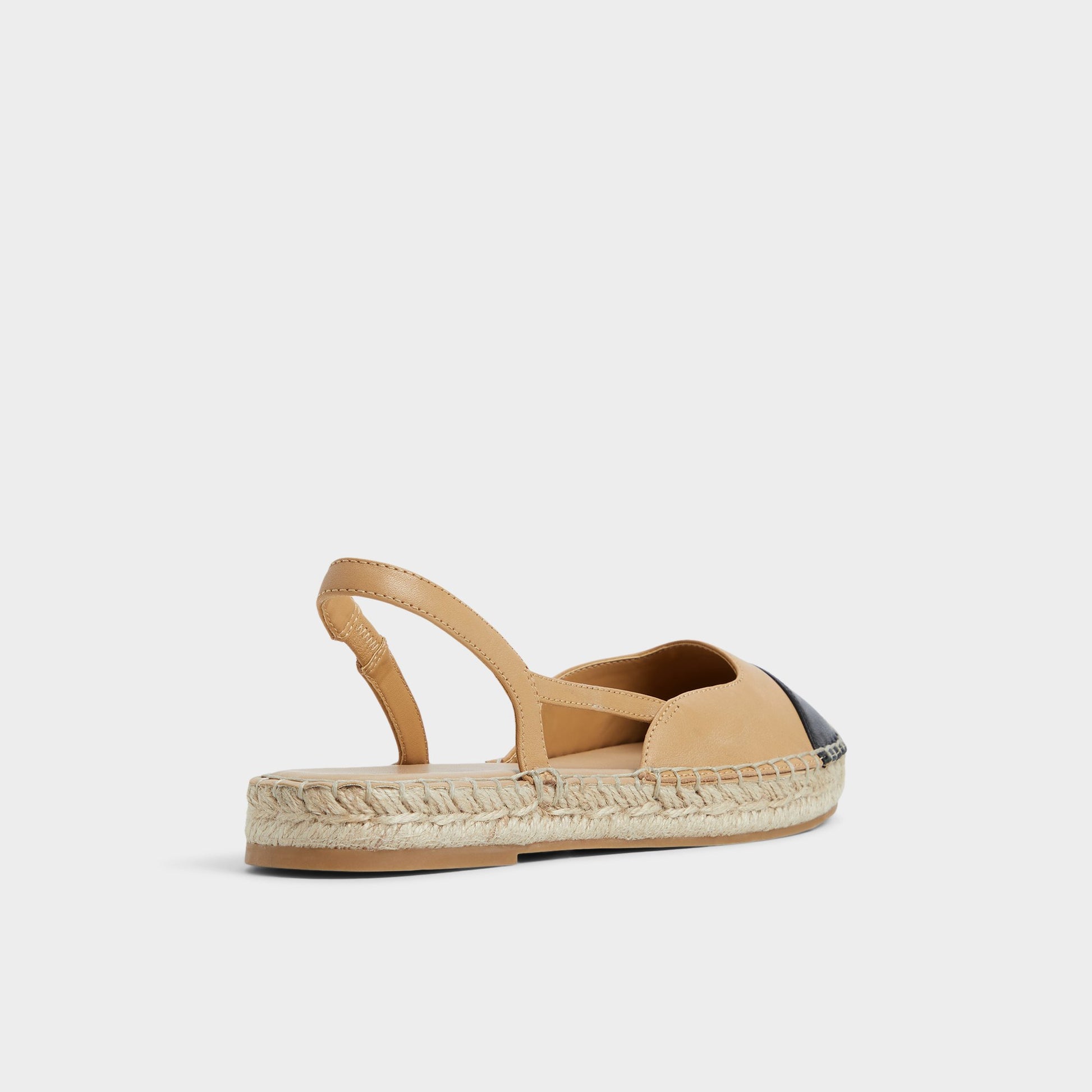 Three-quarter angle of Beige Marelinne Espadrille's back side