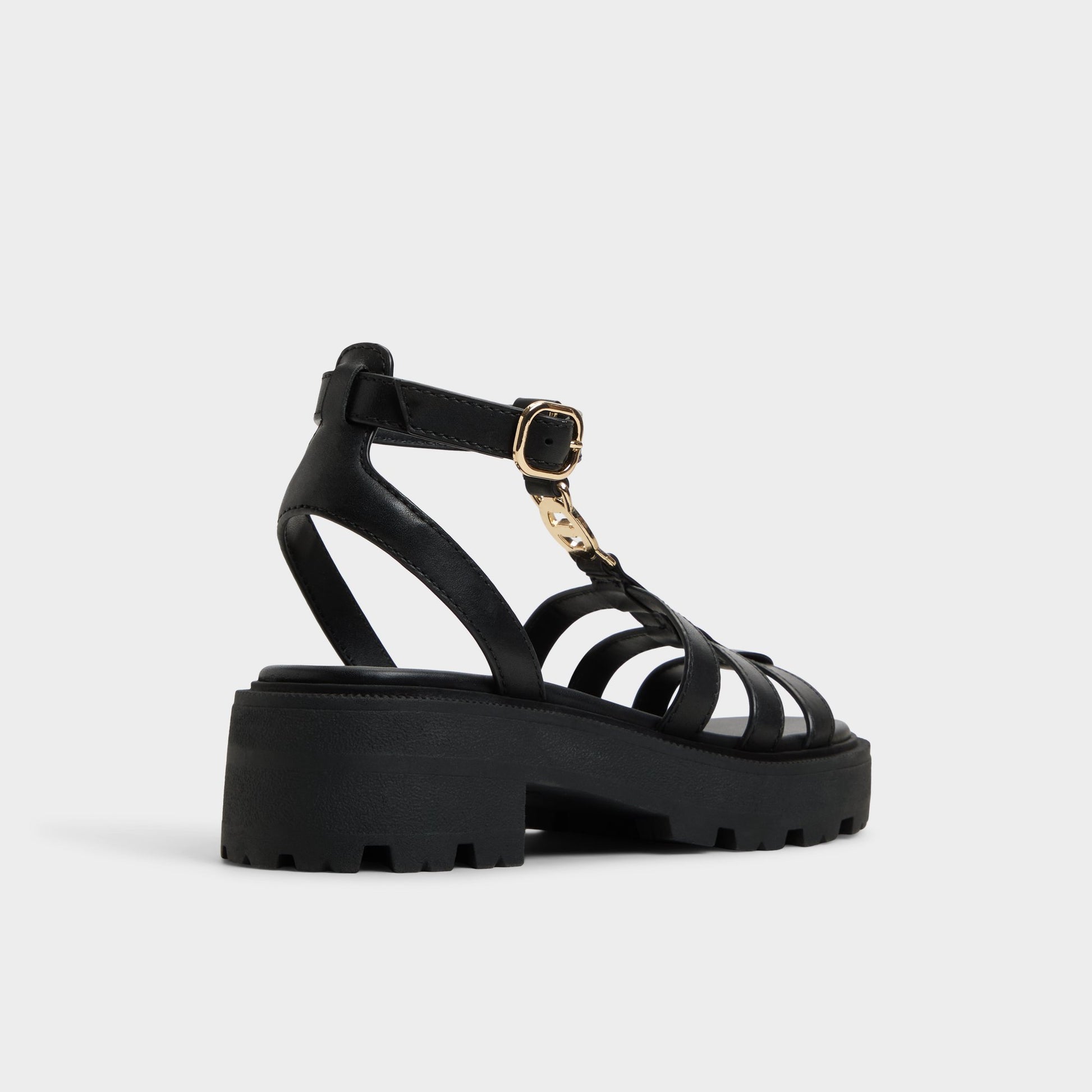 Three-quarter angle of Black Lamington Gladiator sandal's back side
