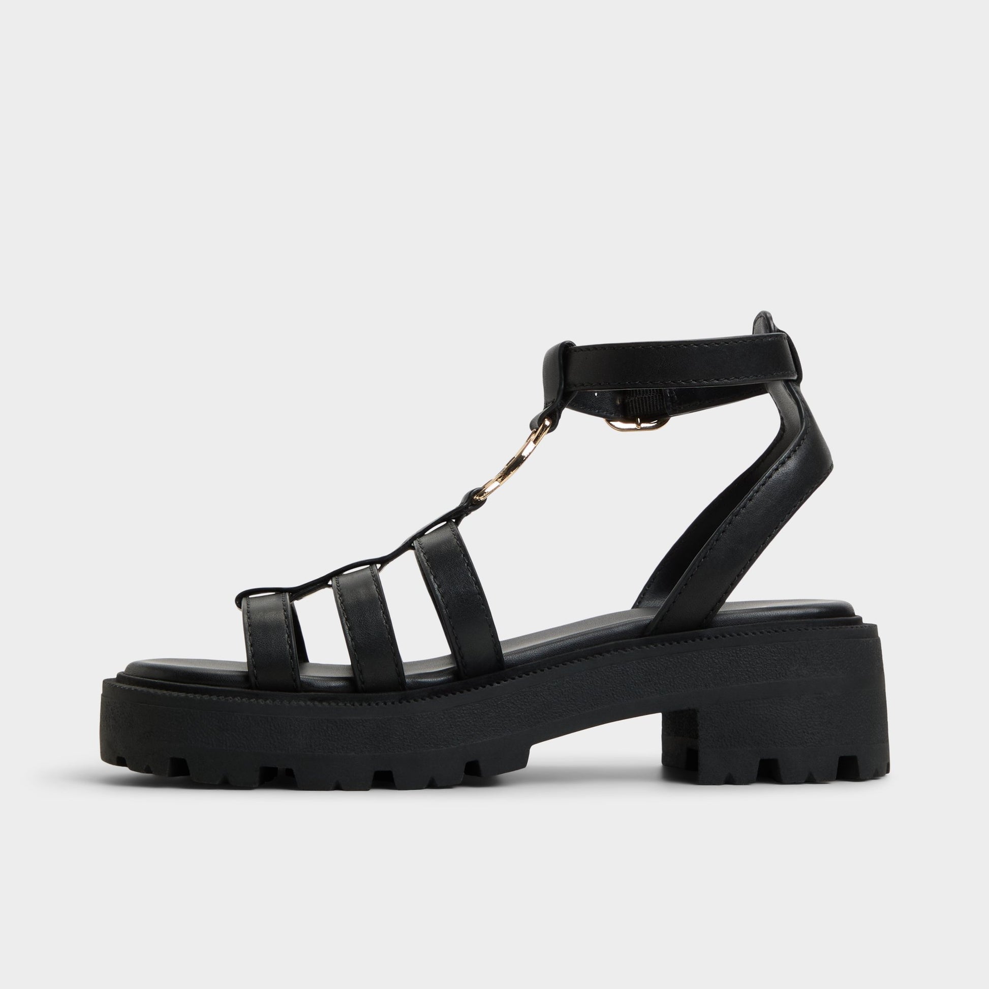 Side view of Black Lamington Gladiator sandal
