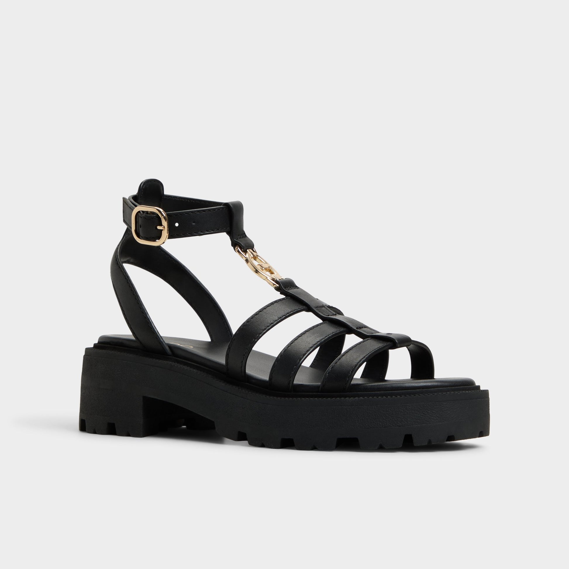 Three-quarter angle of Black Lamington Gladiator sandal's front side