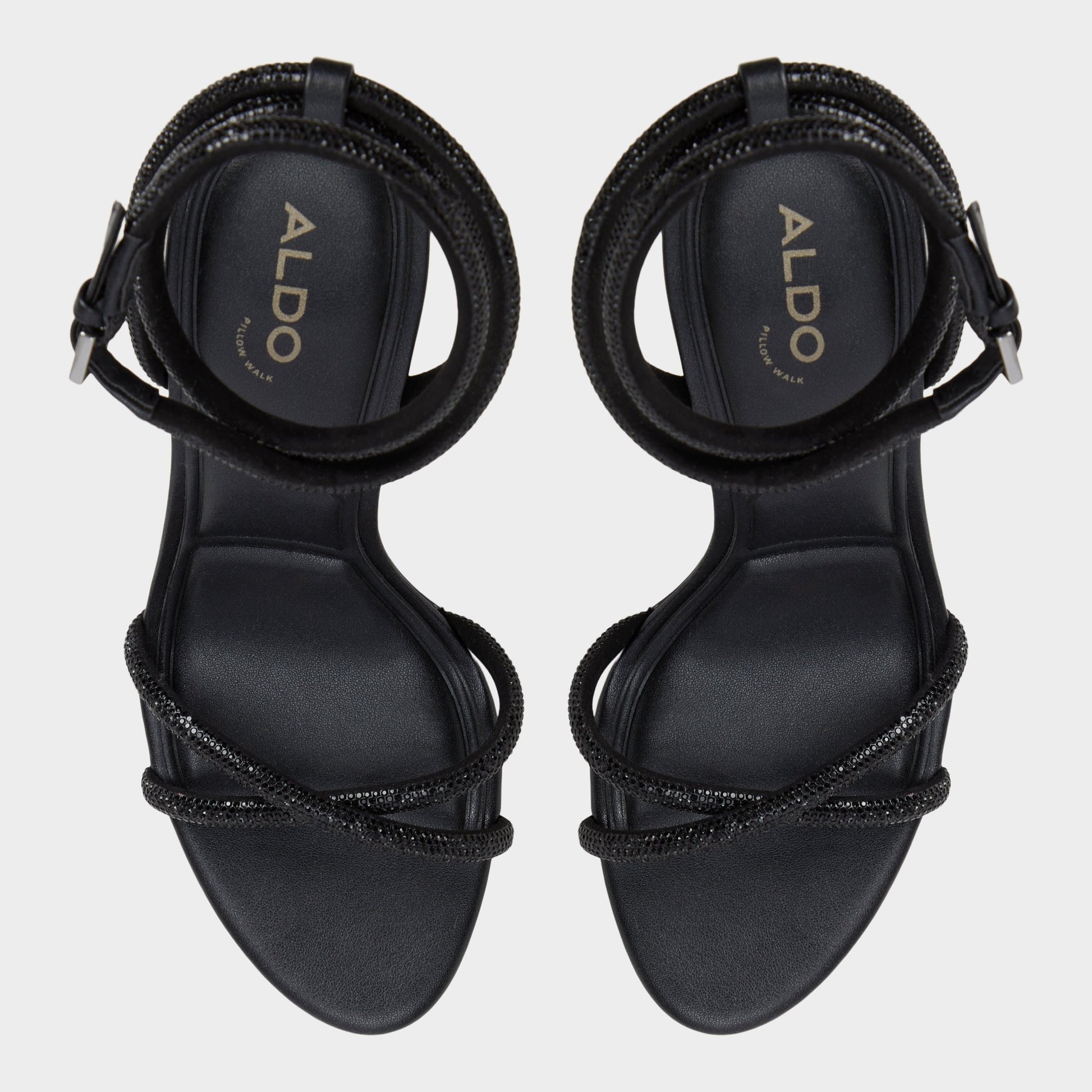 Top-down view of the Black Manaelden Strappy heeled sandal