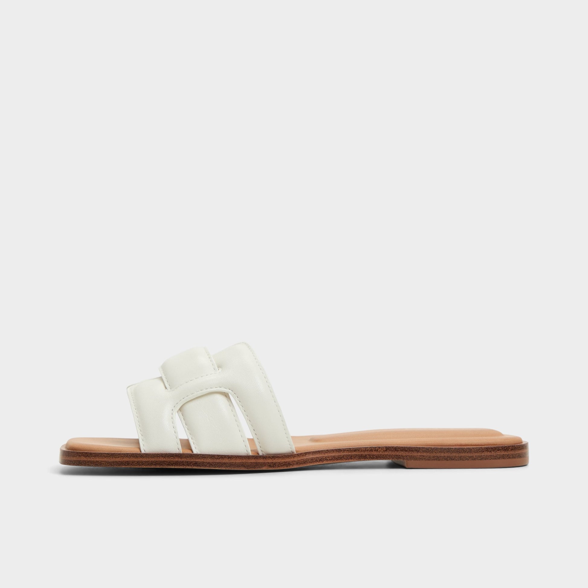 Side view of White Eleny Slide sandal