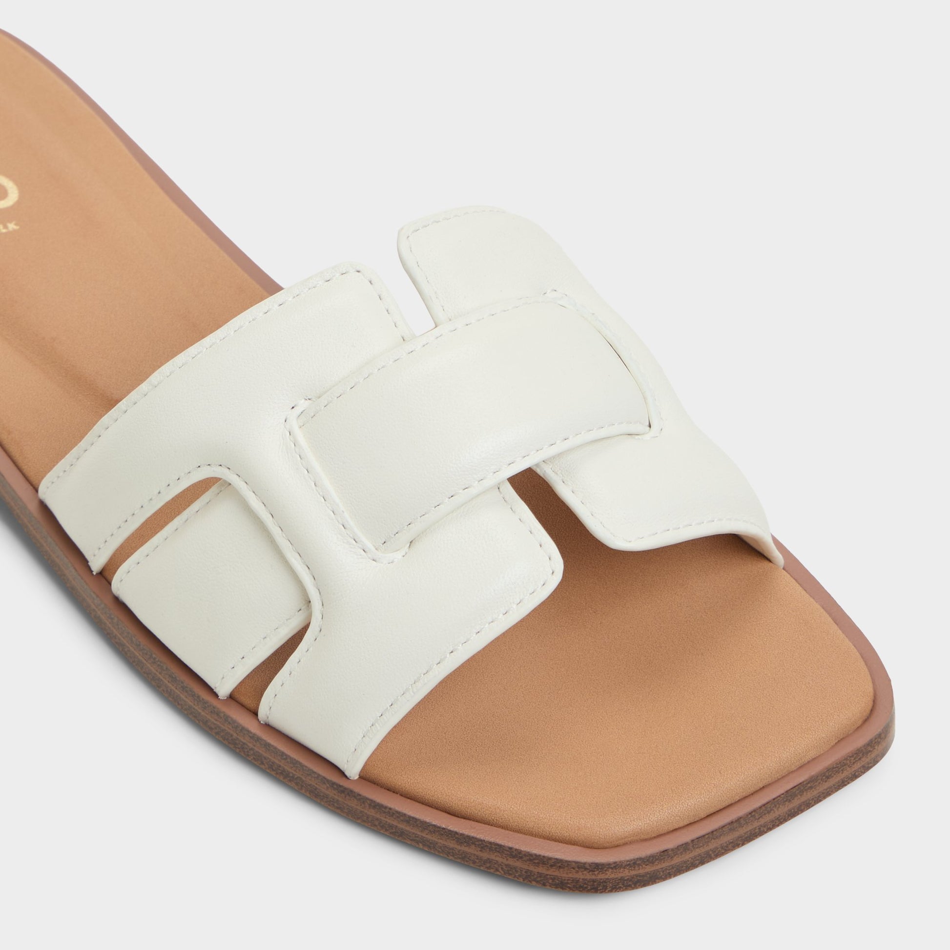 Close-up of the White Eleny Slide sandal