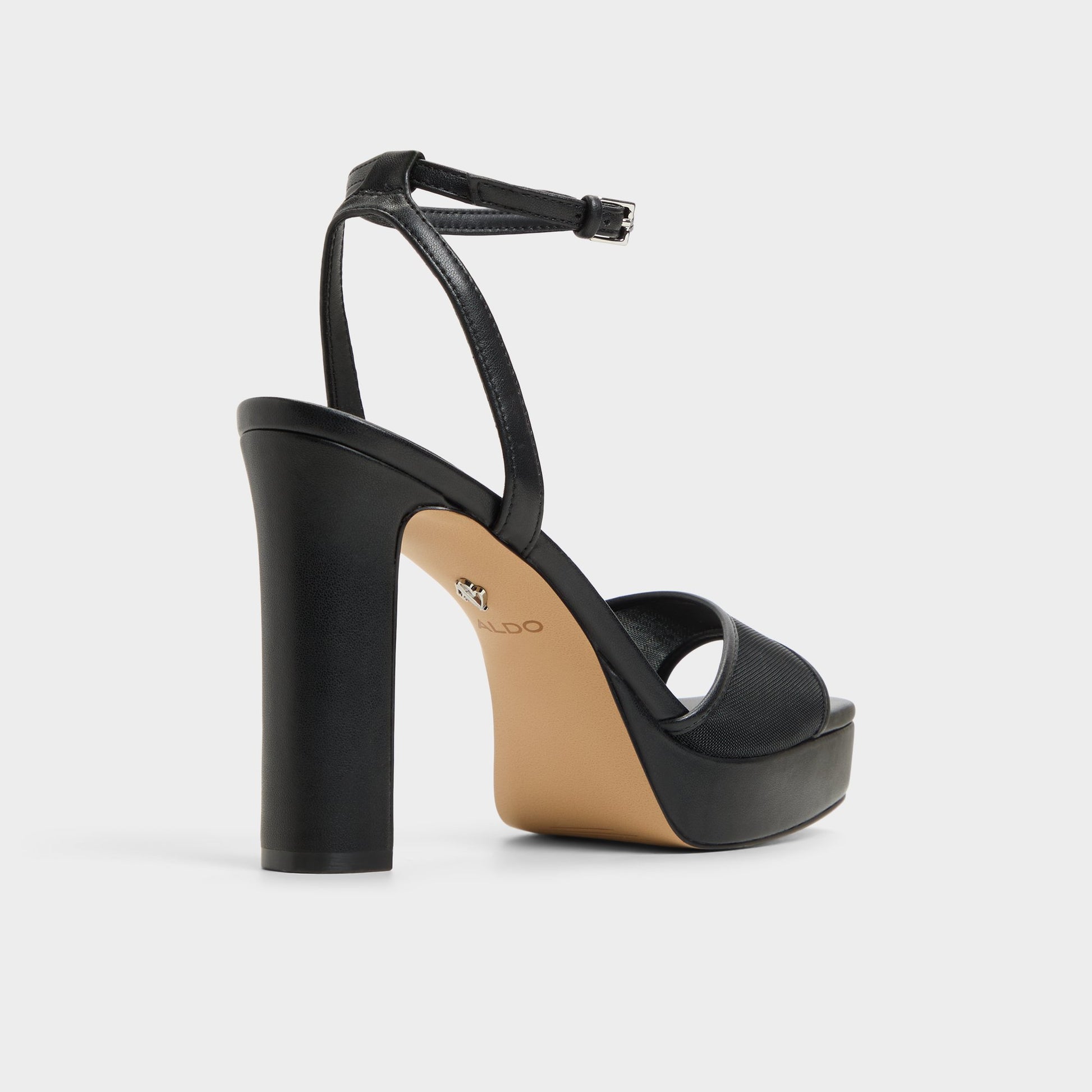 Three-quarter angle of Black Chicglimmer Strappy heeled sandal's back side